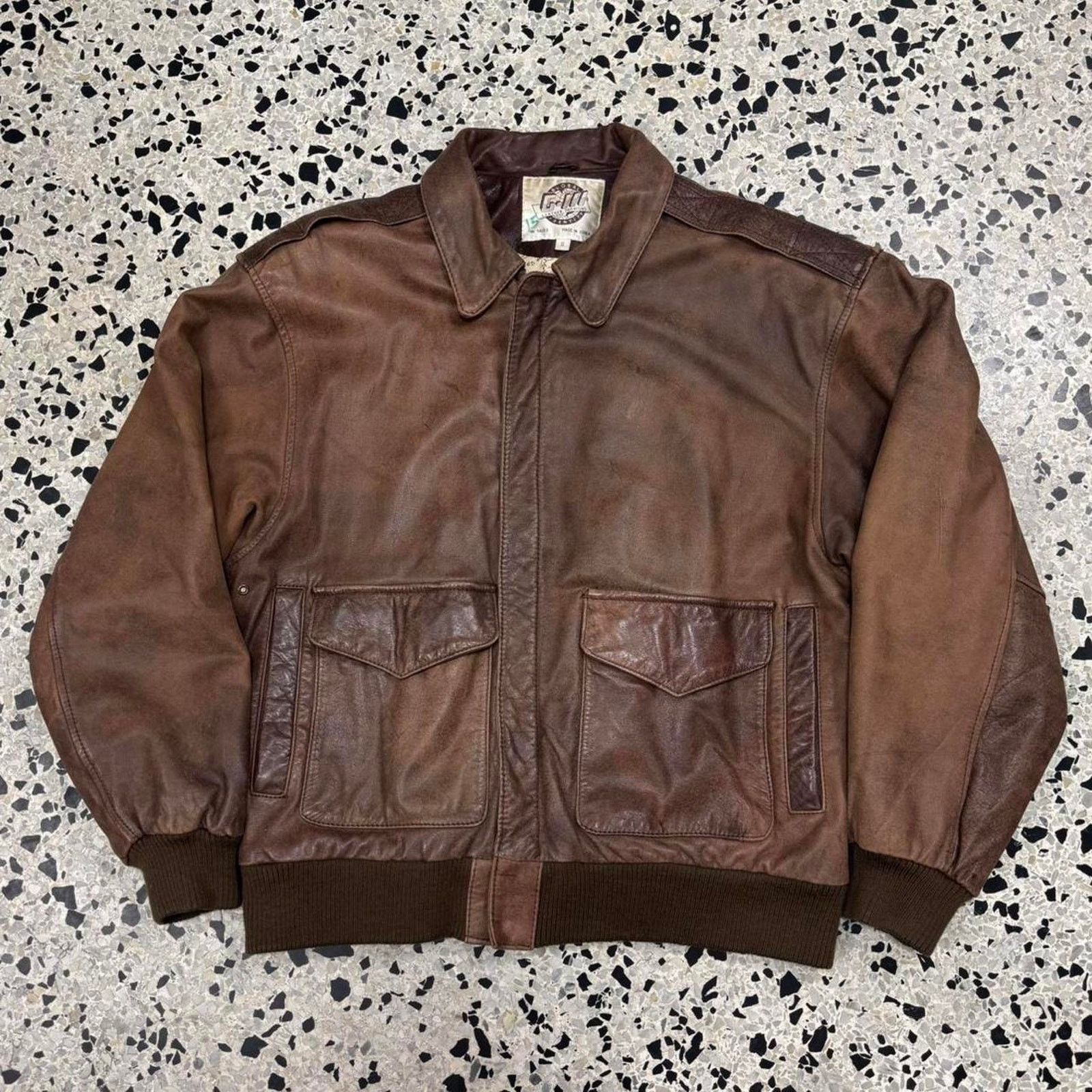 VINTAGE GLOBAL IDENTITY G-III LEATHER JACKET: