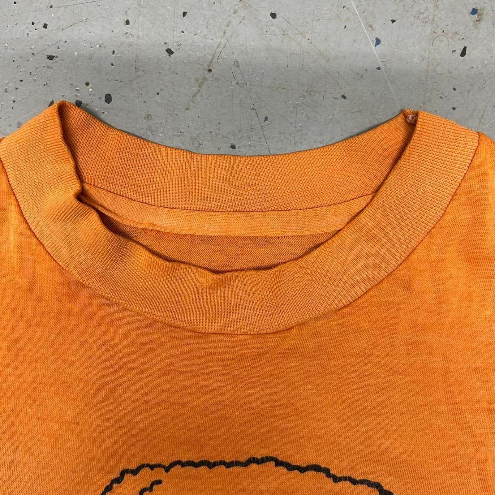 Other 70s orange vintage Stewart’s t-shirt with unique stains Size US L / EU 52-54 / 3 - 4 Thumbnail