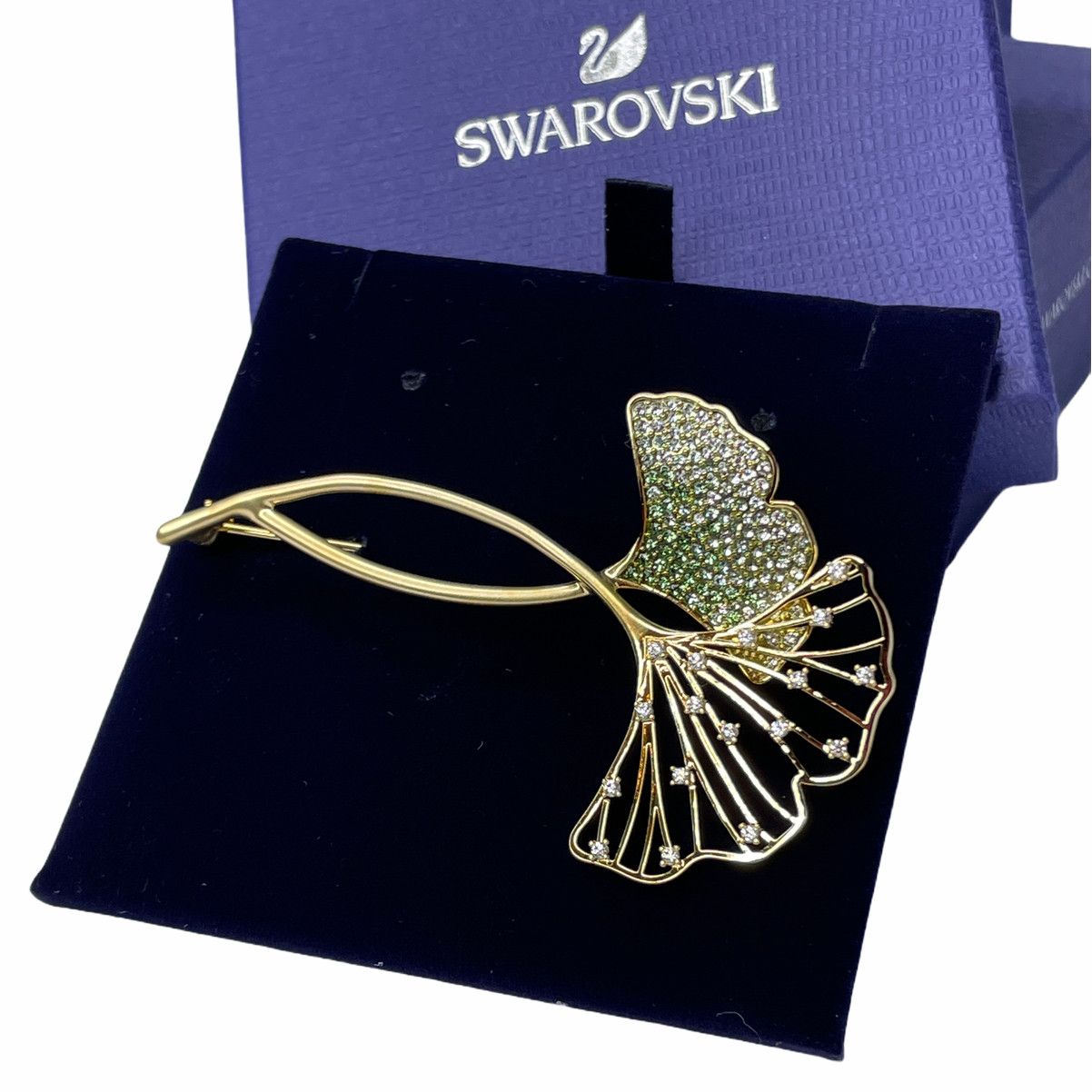 image of Swarovski Stunning Gingko Brooch Green, Gold-Tone Plated, Men's