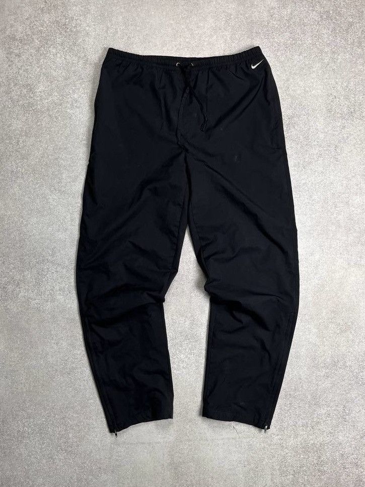 Nike × Vintage VINTAGE NIKE SWOOSH BAGGY NYLON JOGGERS TRACK PANTS Y2K S Size US 31 - 1 Thumbnail