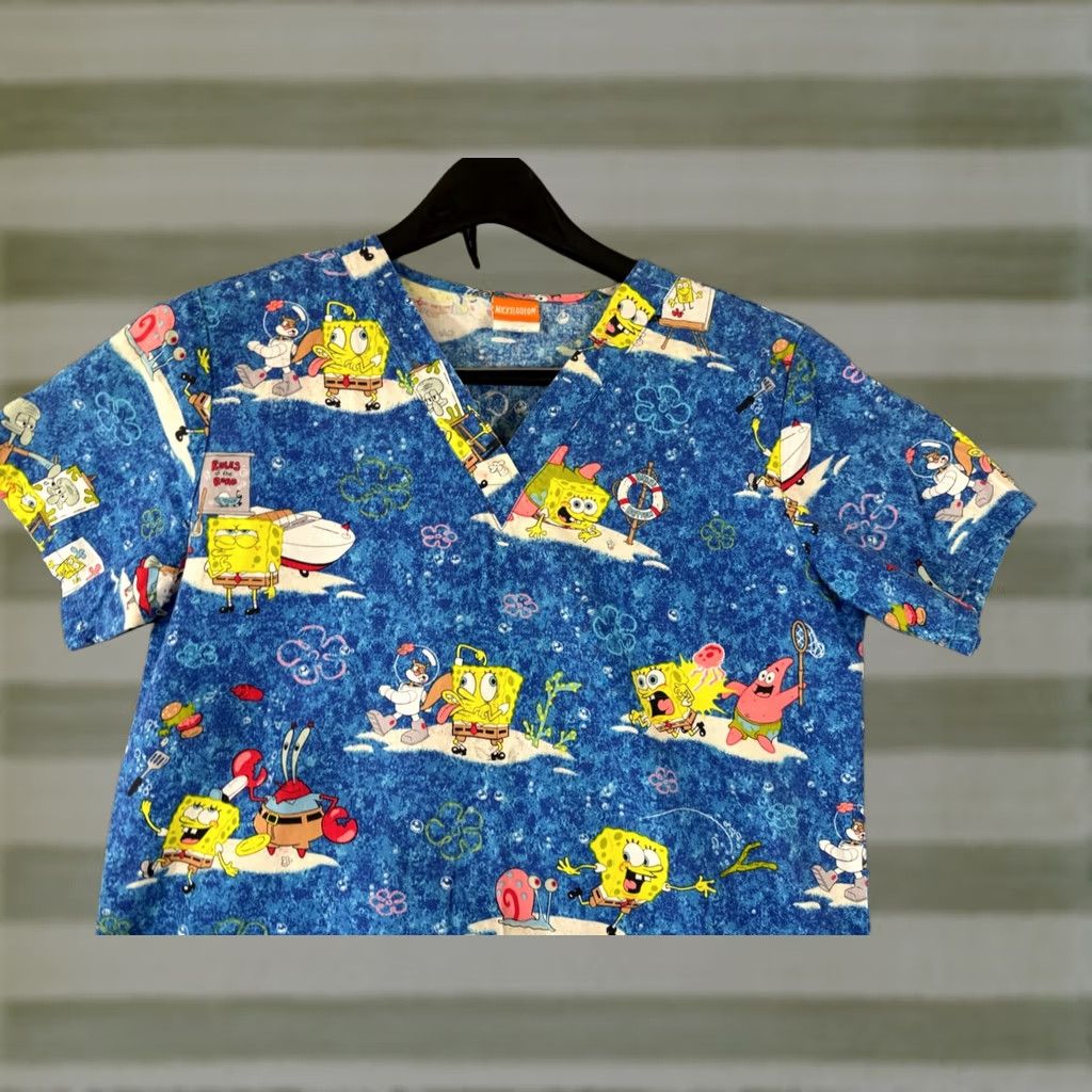 Nickelodeon VINTAGE Nickelodeon SpongeBob SquarePants Scrub Top Shirt Womens XS Blue V-Neck Pockets Size XS / US 0-2 / IT 36-38 - 1 Thumbnail