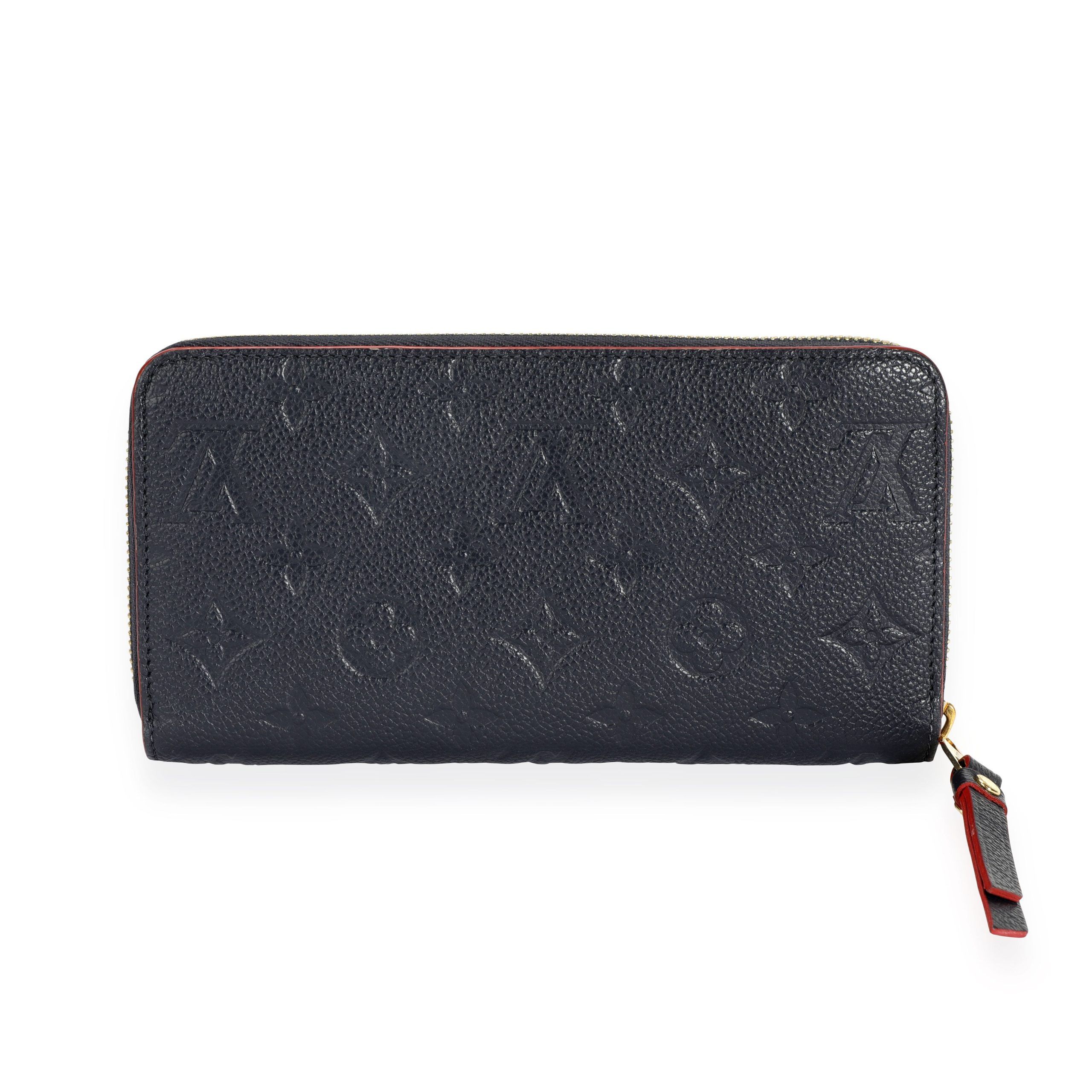 image of Louis Vuitton Marine Rouge Monogram Empreinte Zippy Wallet in Blue, Women's
