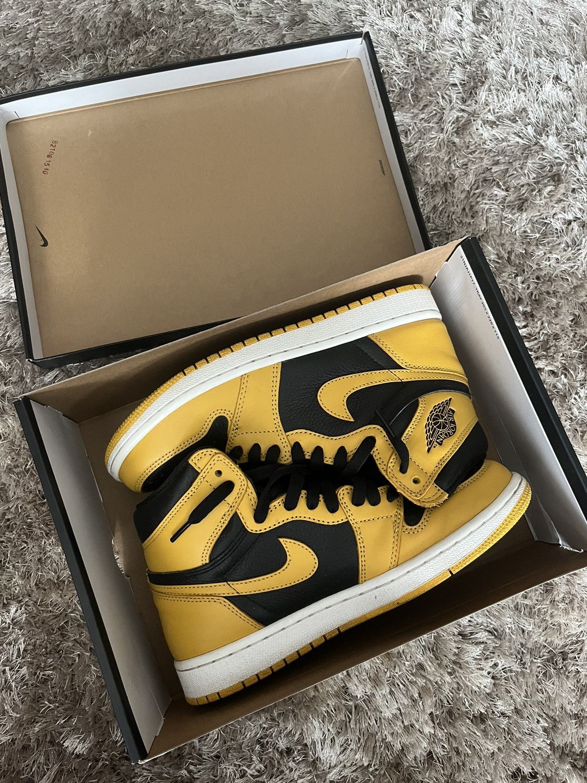 image of Jordan Nike Air Jordan 1 Pollen Shoes in Black, Men's (Size 7)