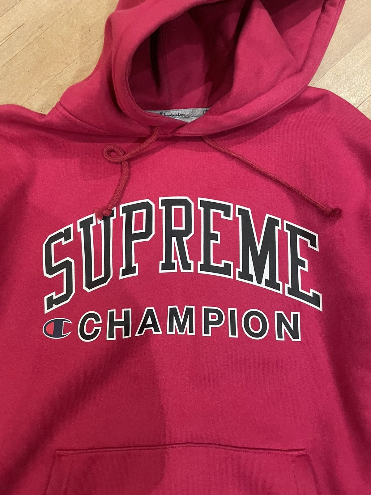 Red supreme cheap champion hoodie