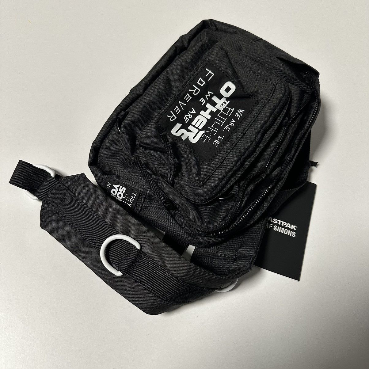 image of Eastpak X Raf Simons Waist Bag Loop in Black, Men's