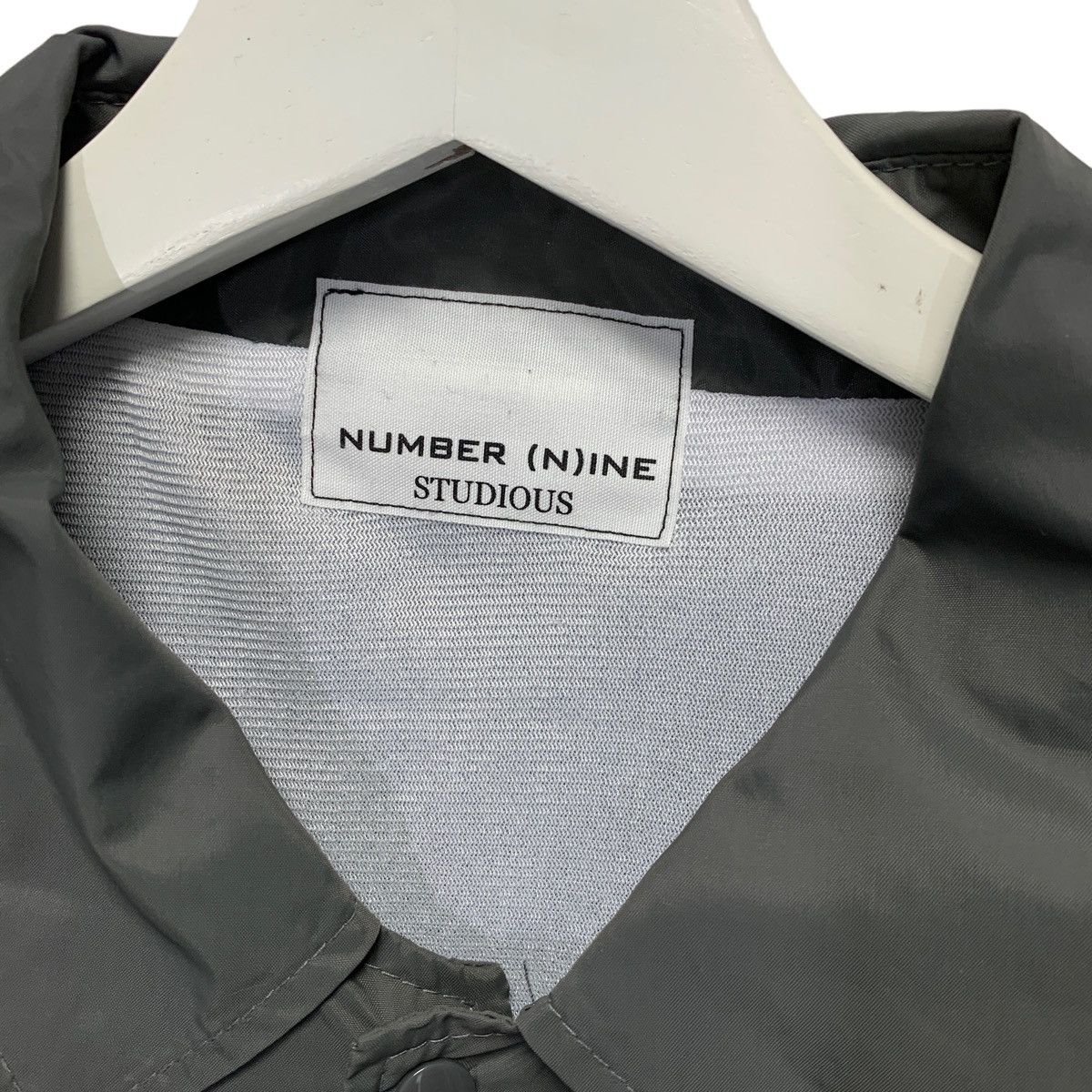 Number (N)ine NUMBER NINE GUITAR PICK LOGO COACH JACKET GREY Size US S / EU 44-46 / 1 - 4 Thumbnail