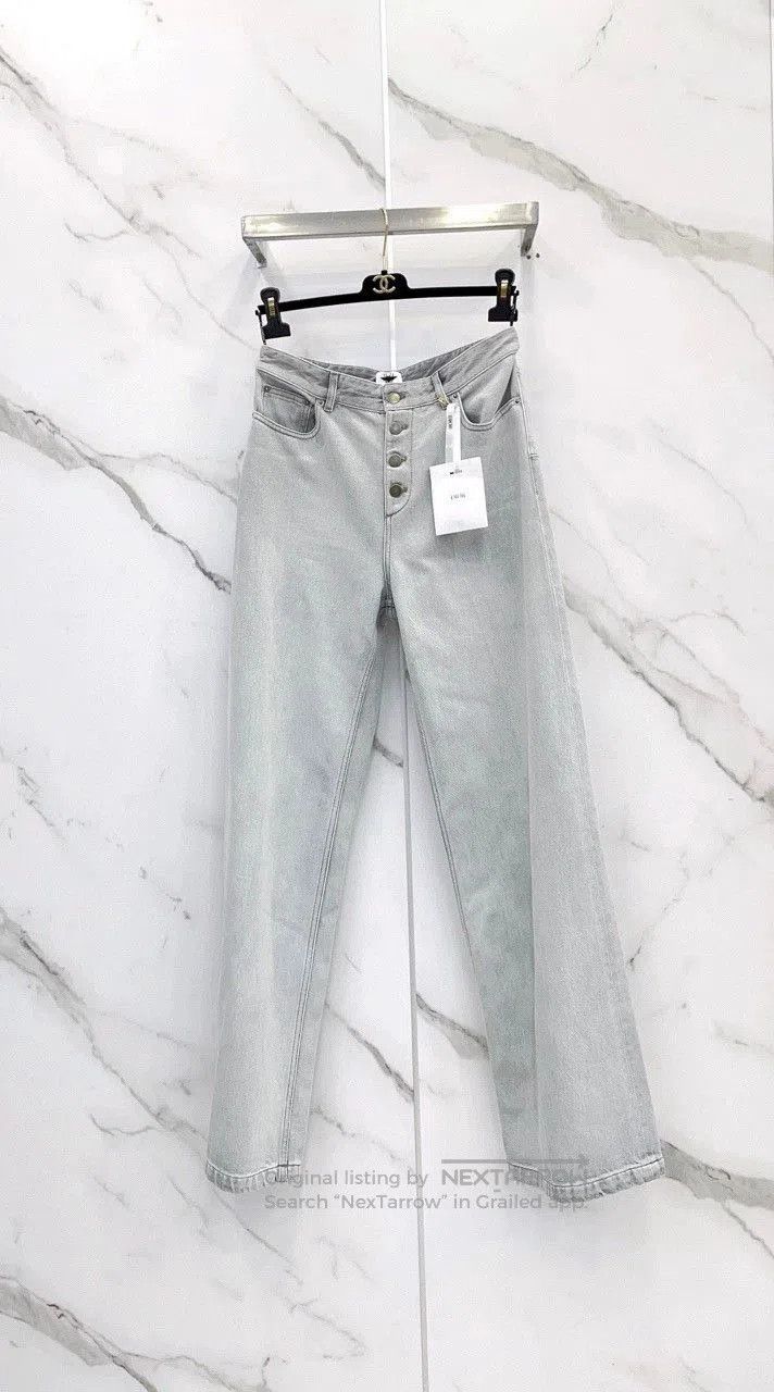gray wide-leg jeans by Dior.