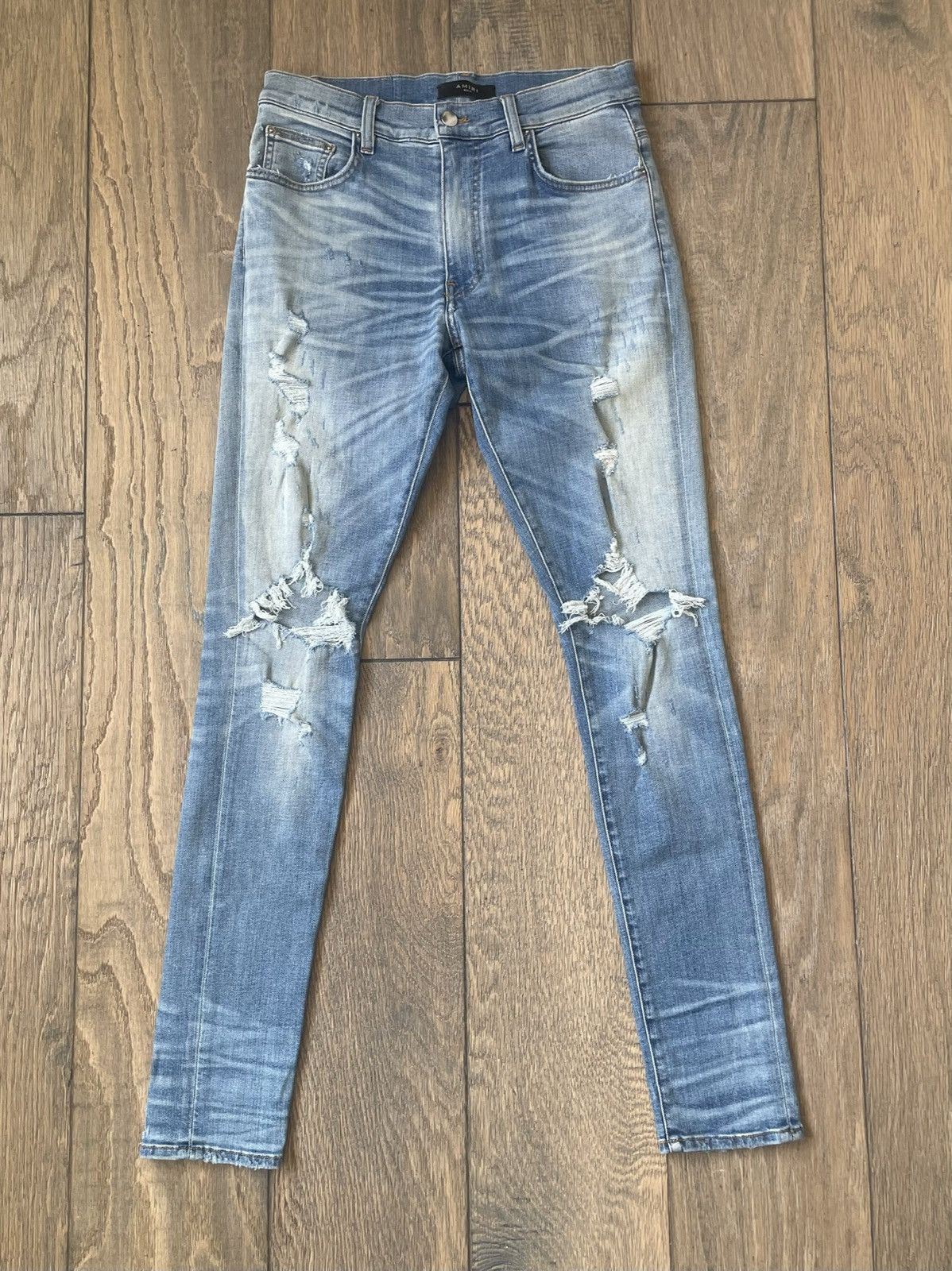 image of Amiri Distressed Skinny Jeans in Blue, Men's (Size 31)