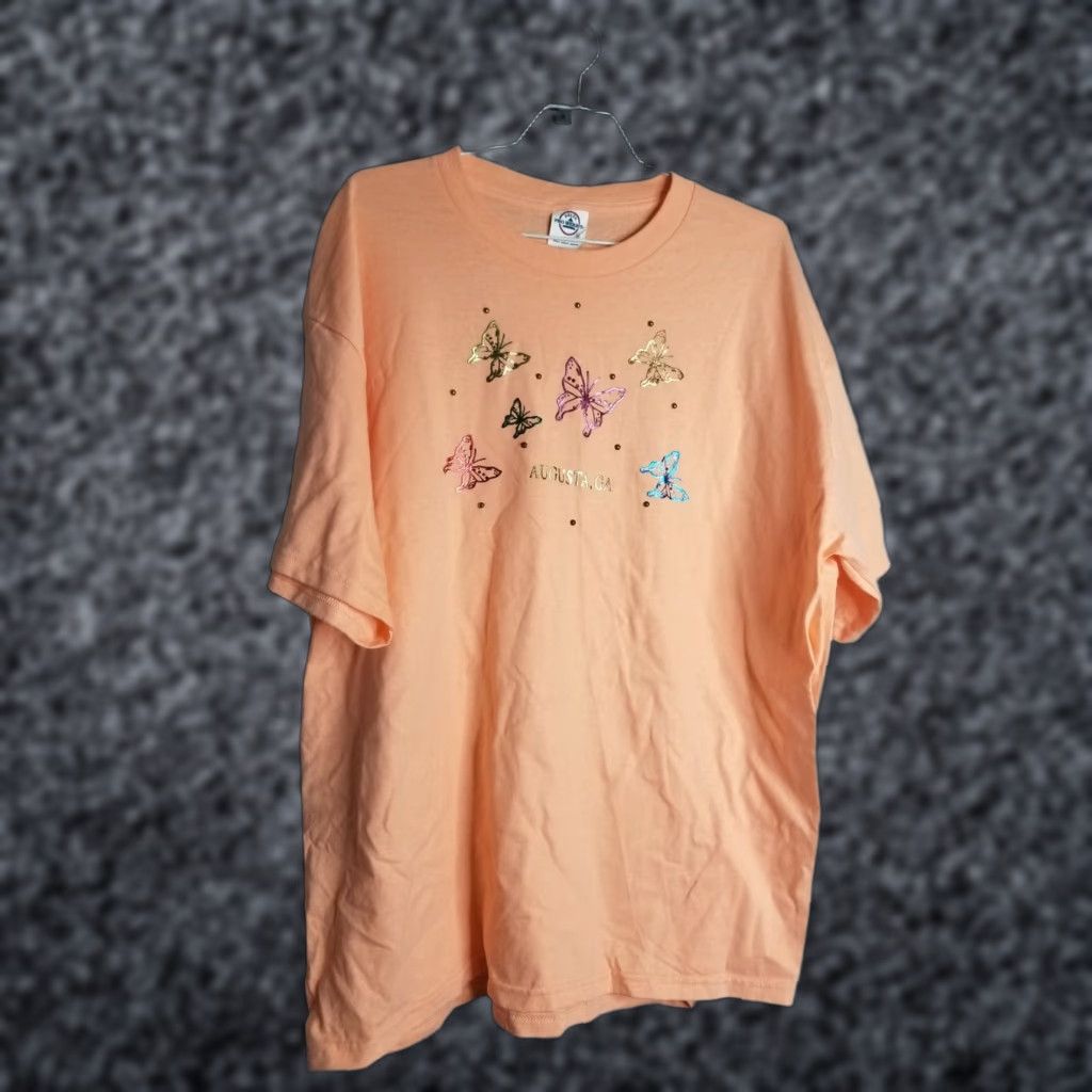 Delta VINTAGE Delta T-Shirt Main Selling Point: Butterfly Embellished Travel Souvenir Shirt Men XL Orange Butterfly Graphic 1980s 1990s Size US XL / EU 56 / 4 - 1 Thumbnail