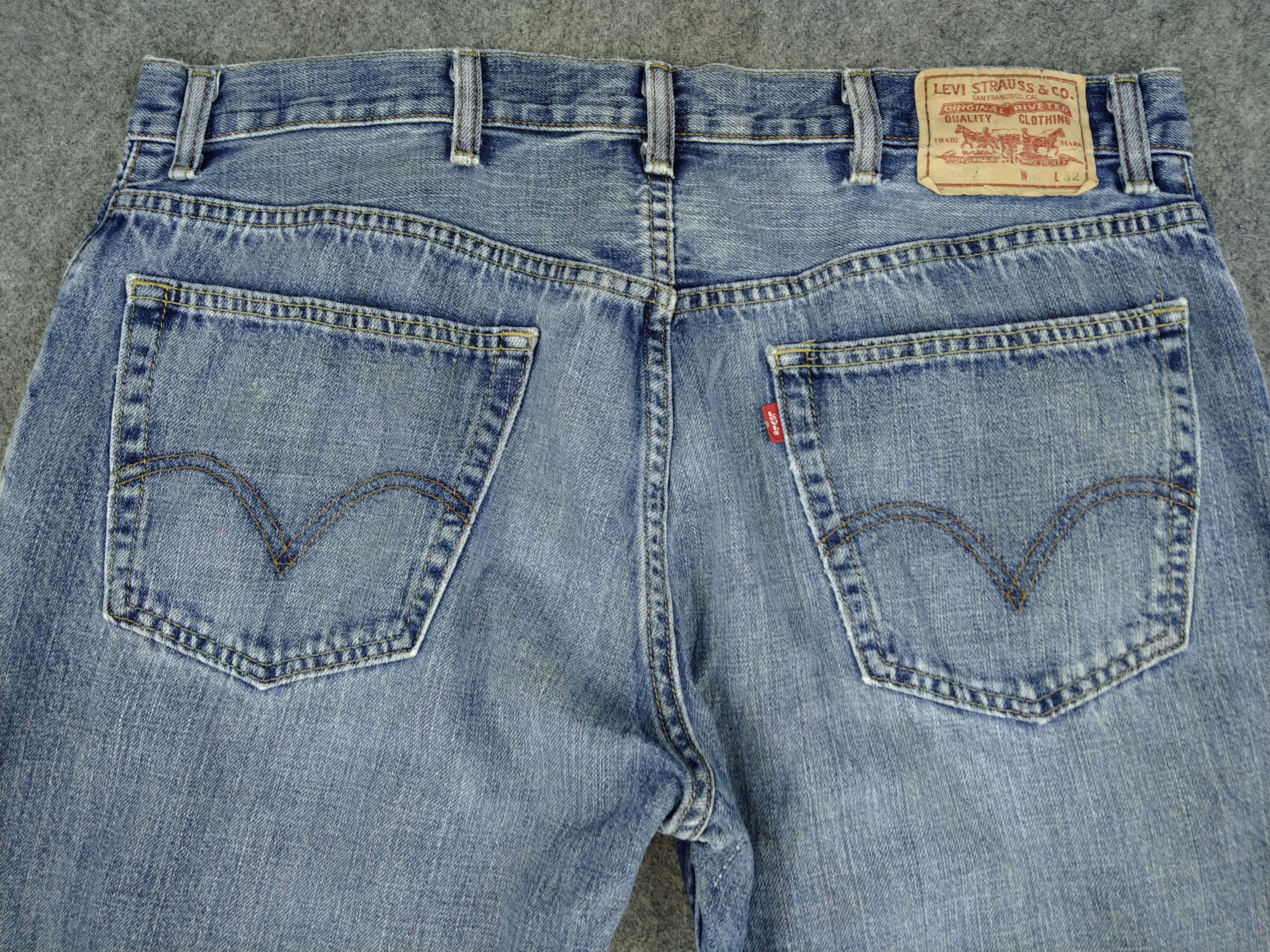 Faded Blue Vintage Levi's 557 Jeans 38x31 Denim -JG042