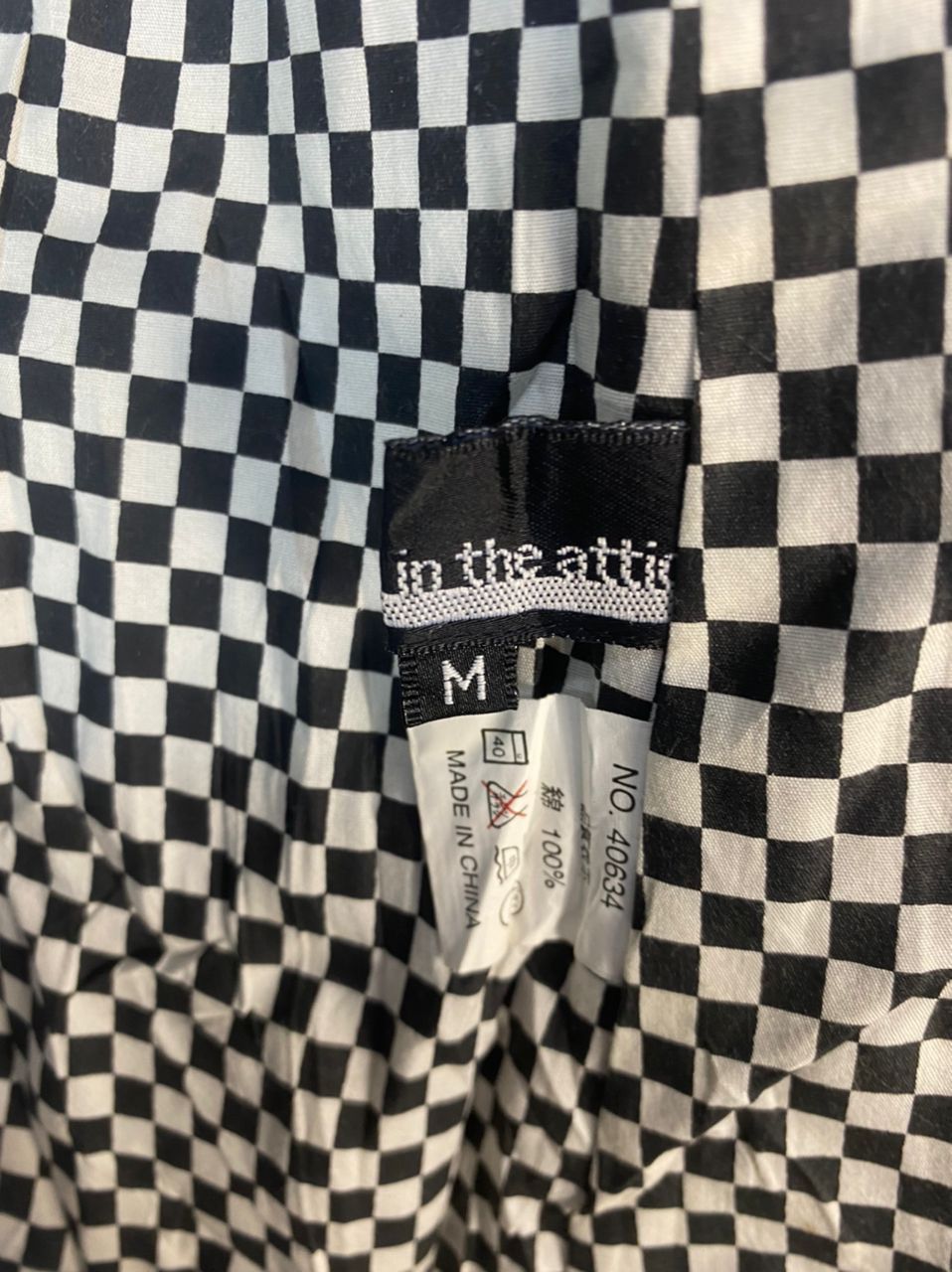 In the attic button black jacket