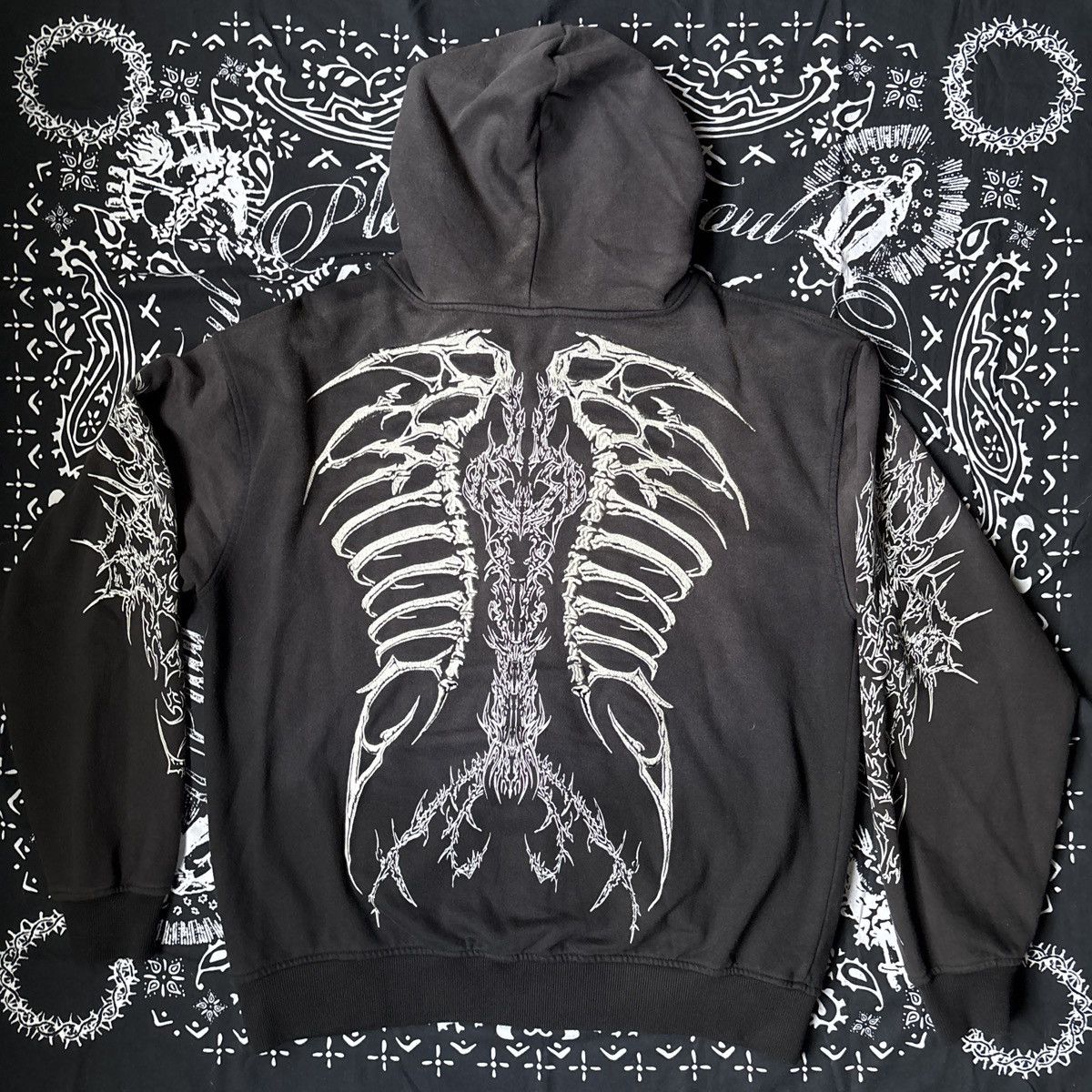 Cradle of bones zip up