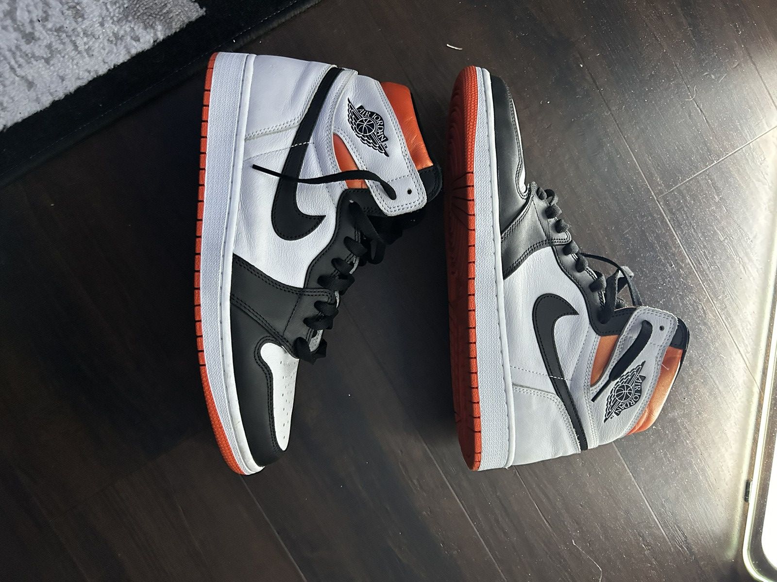 image of Nike Jordan 1 Hight Electro Orange Shoes in Black/White/Orange, Men's (Size 12)