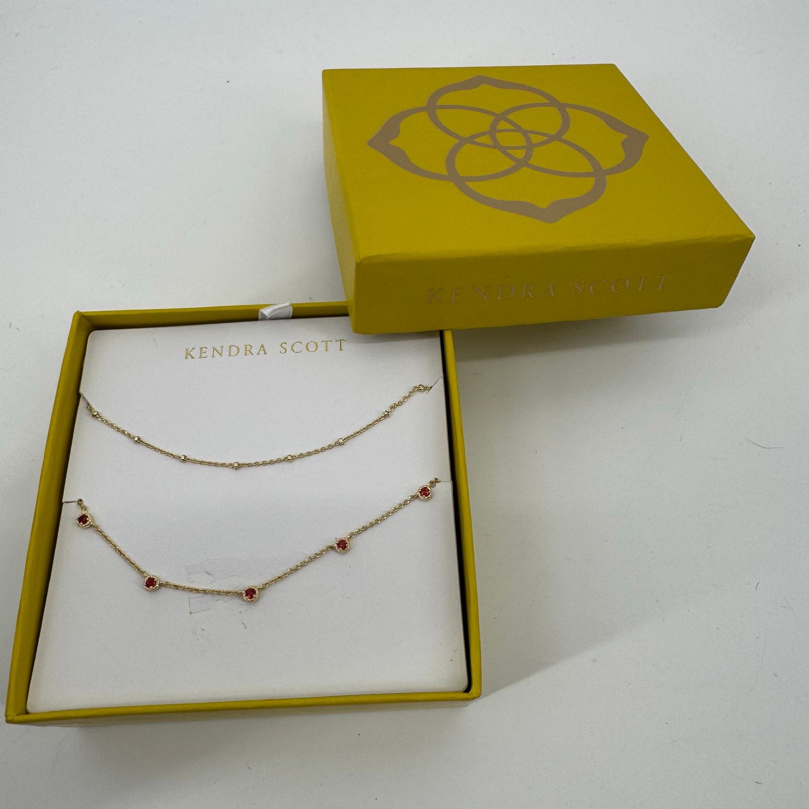 Kendra Scott Kendra Scott Gold Tone Layered Necklace Set Red Crystal New Size ONE SIZE - 1 Thumbnail
