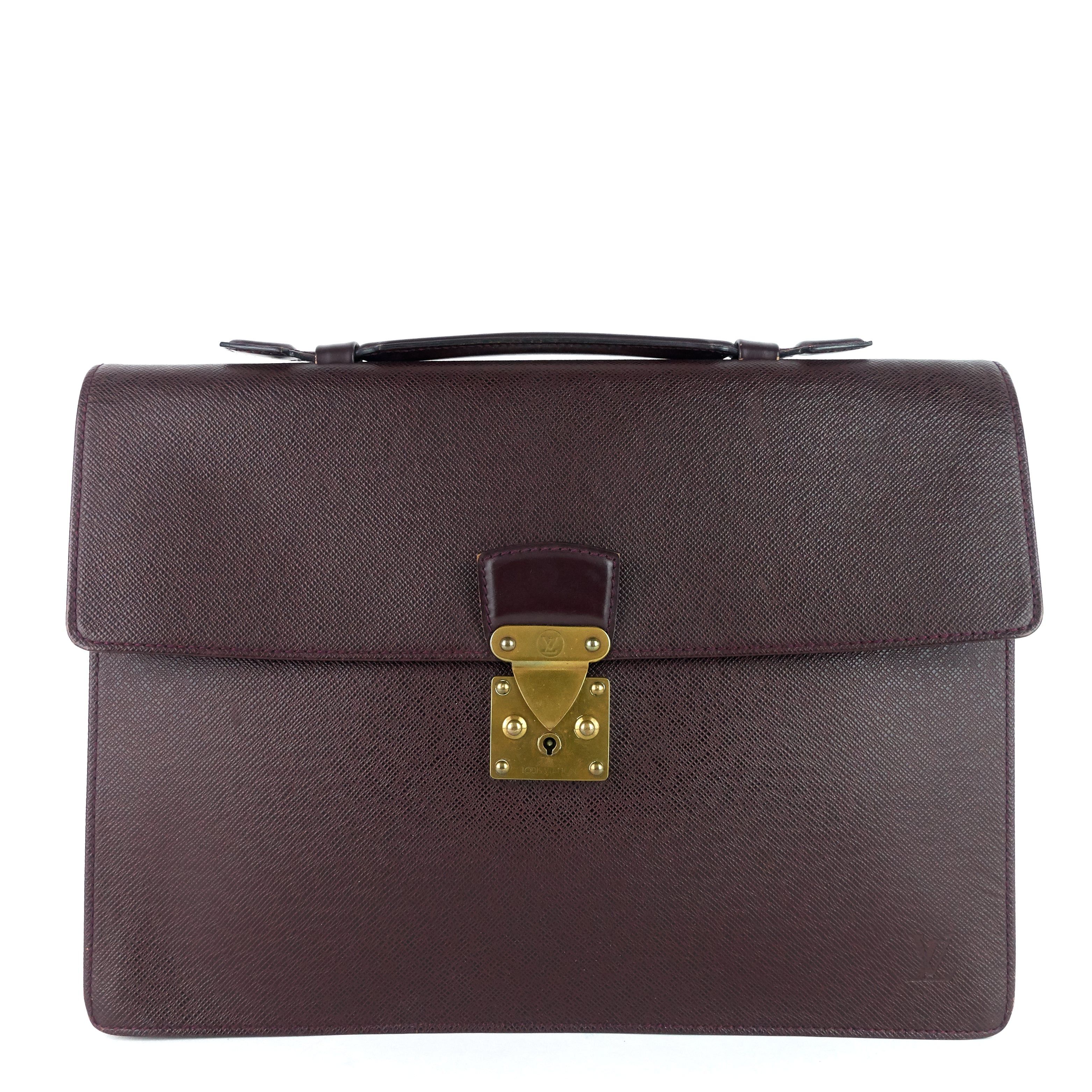 image of Louis Vuitton Serviette Kourad Taiga Leather Briefcase Bag in Purple, Women's