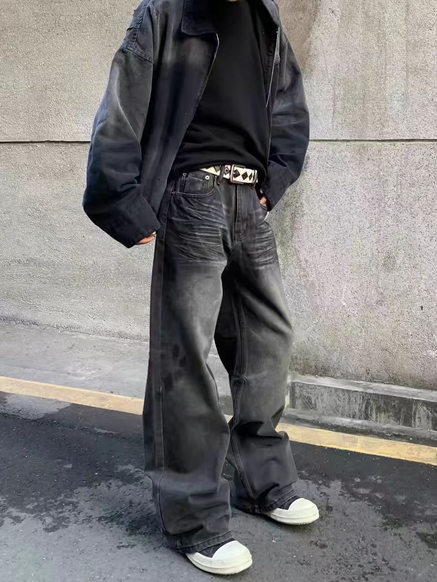 Washed and dirty dyed distressed micro flare baggy jeans