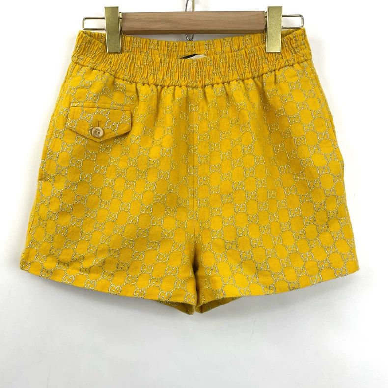 Gucci Gucci Gold silk full-printed logo shorts Size 24" / US 00 / IT 34 - 1 Thumbnail