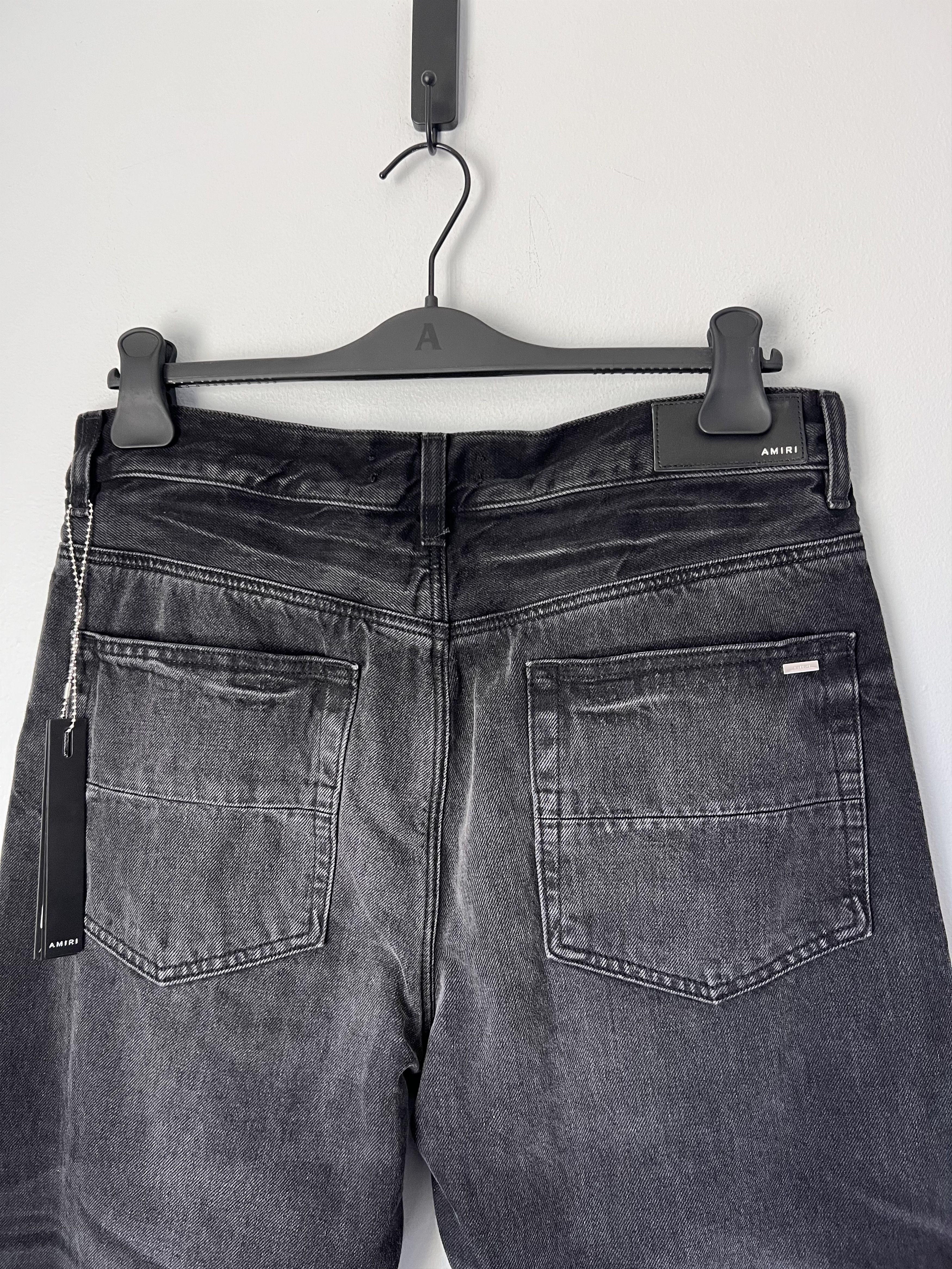 Amiri Release Hem Straight Leg Jeans in Black