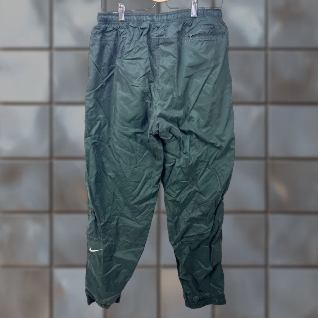 Nike VINTAGE Nike Swoosh Windbreaker Track Pants Large Men Black 90s Casual Pants Size US 33 - 1 Thumbnail