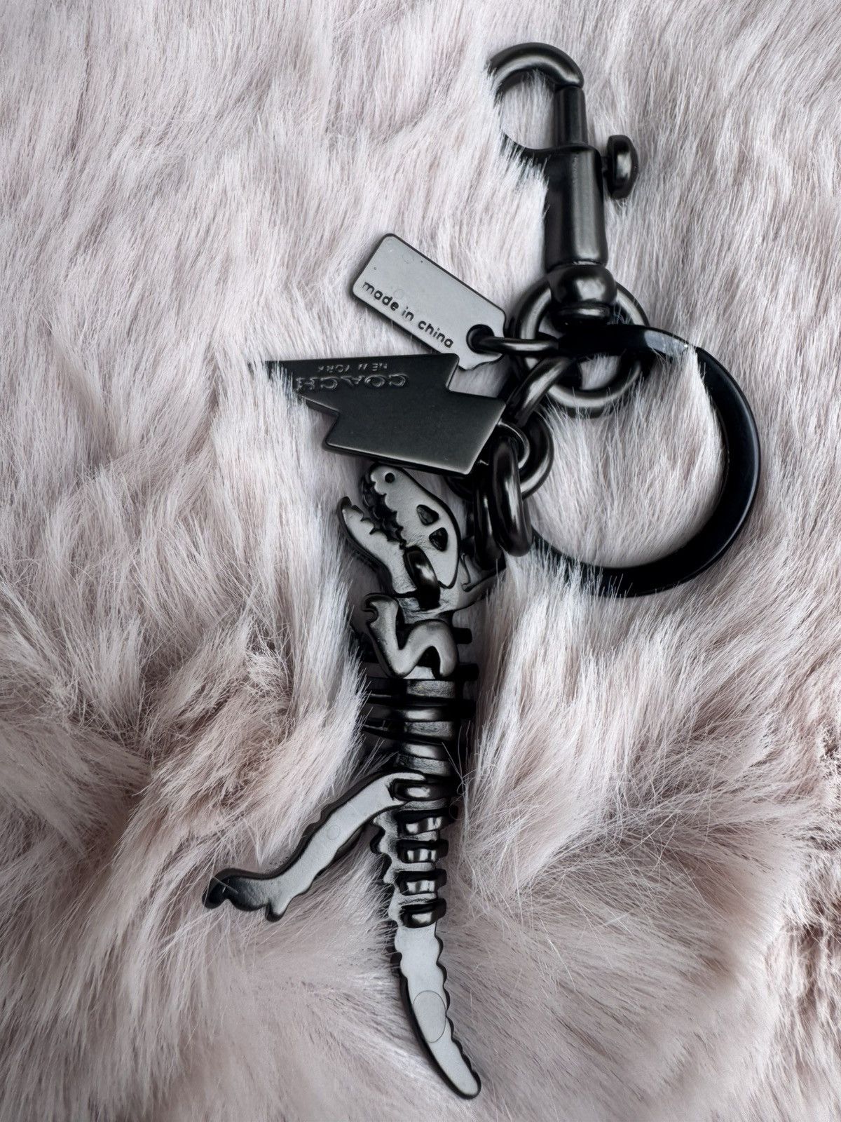 Coach Coach Metal Small Rexy T-Rex Skeleton Puzzle Charm Keychain Size ONE SIZE - 1 Thumbnail