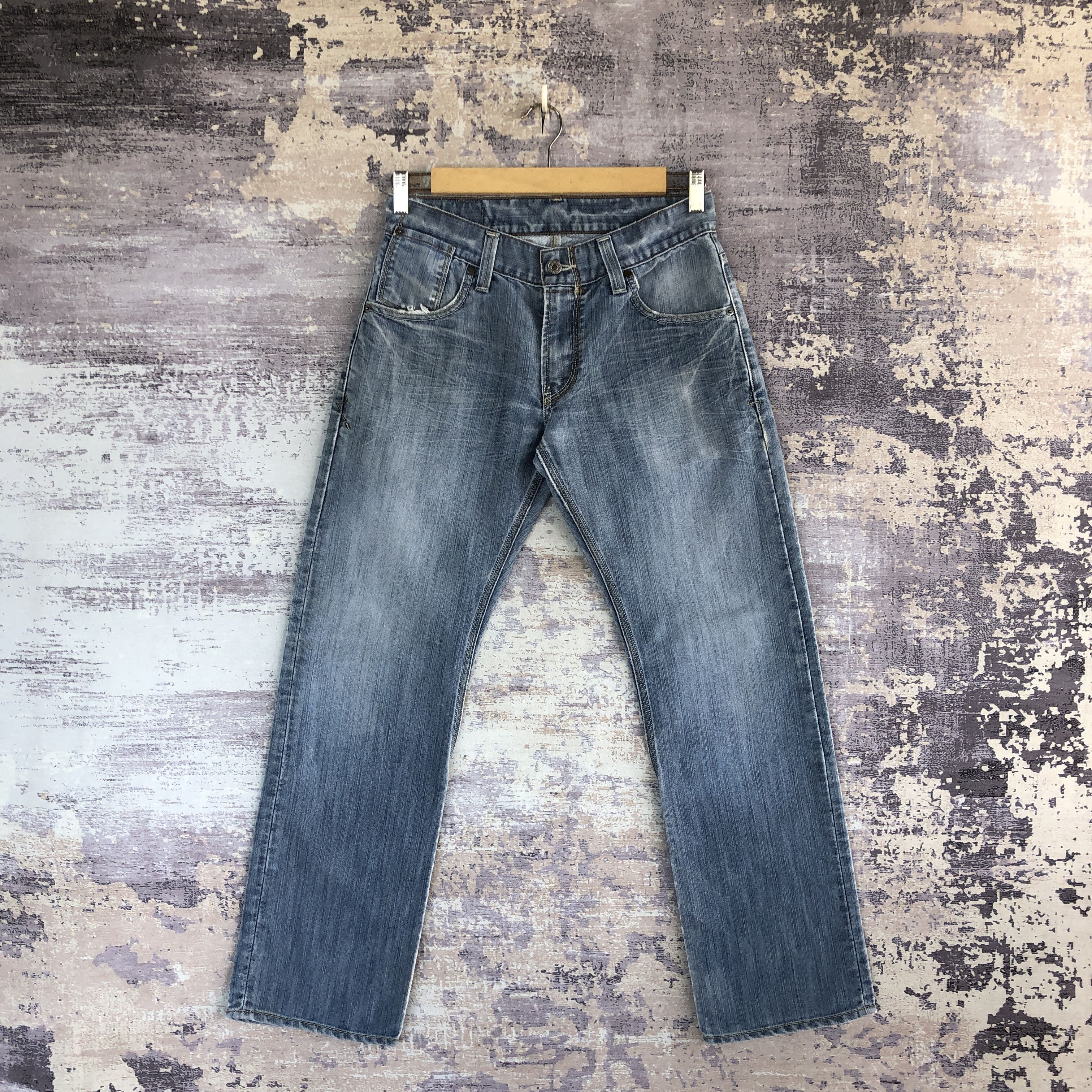 Vintage Levi's Jeans Levis 514 Ripped Light Wash Denim