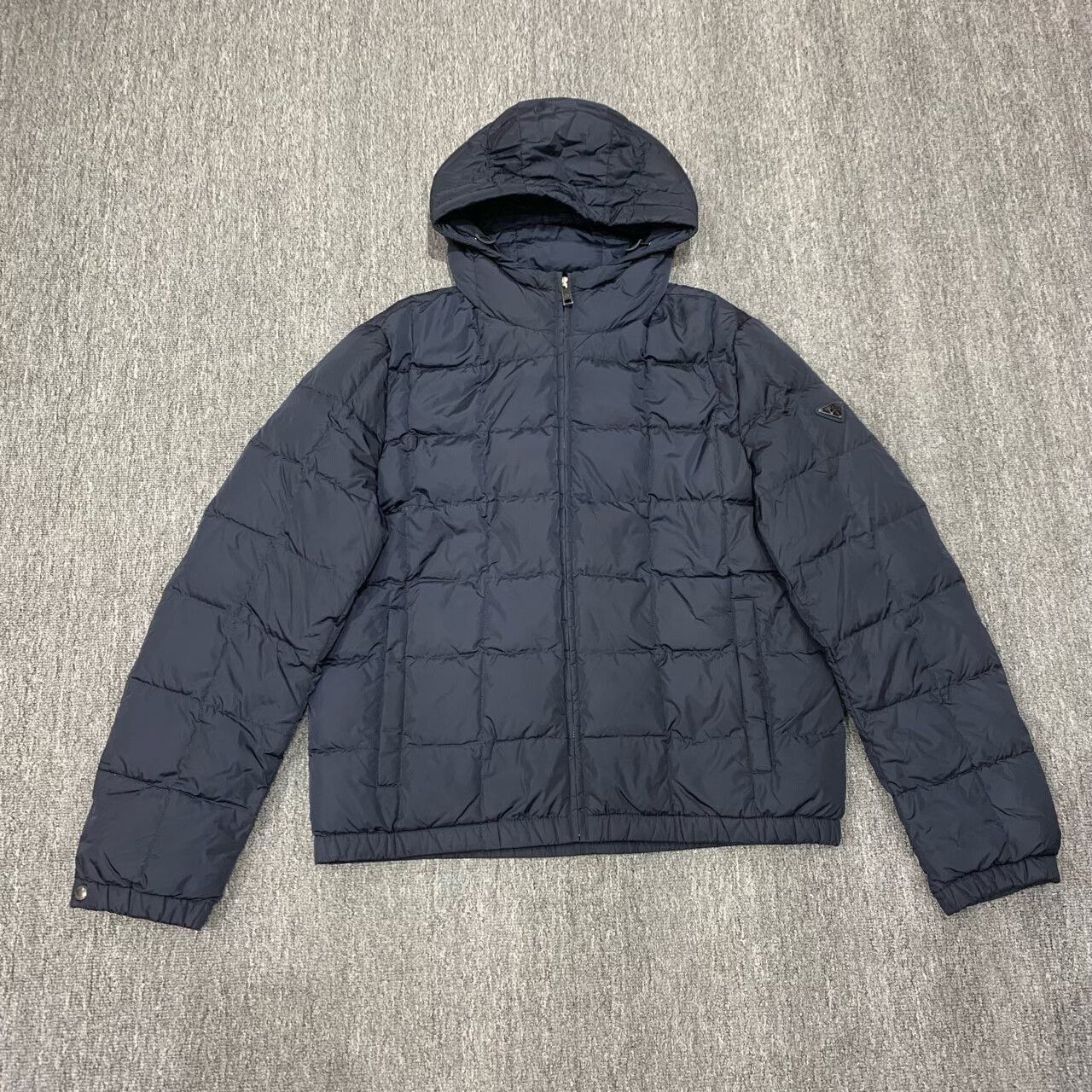 prada navy triangle logo down jacket