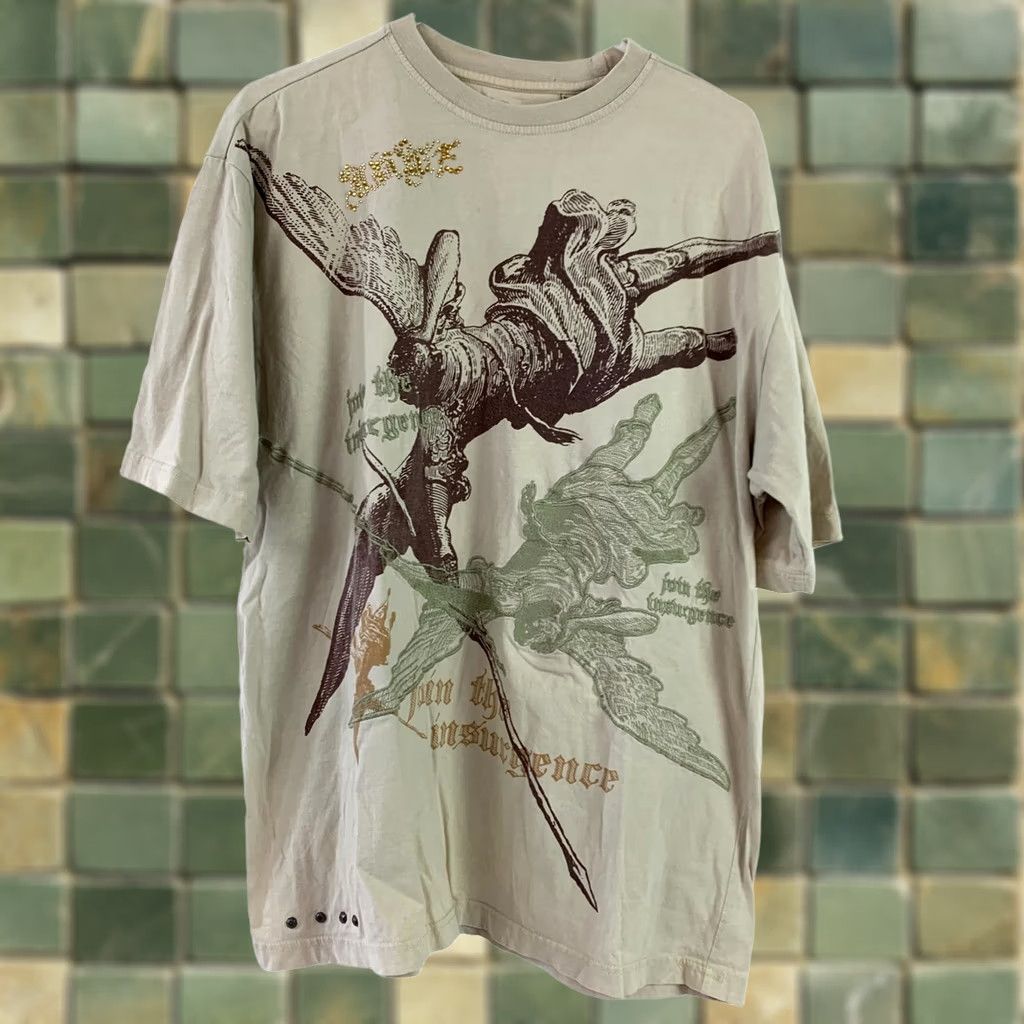 Vintage VINTAGE Nostic Fallen Angel Join The Insurgence Rhinestone Tee T-Shirt L Tan Unisex Adults Large Graphic Print Crew Neck Short Sleeve Cotton Size US L / EU 52-54 / 3 - 1 Thumbnail