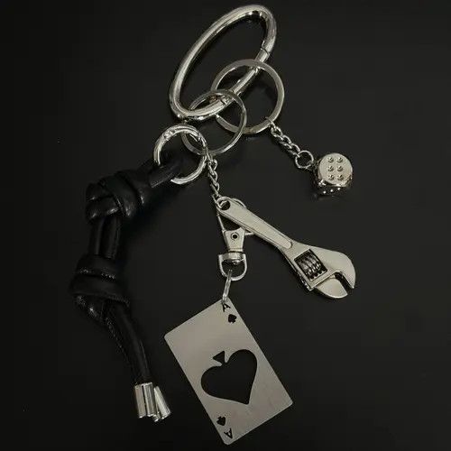 Jewelry Black Leather Knot Keychain with Metal Wrench & Dice Charms Size ONE SIZE - 1 Thumbnail