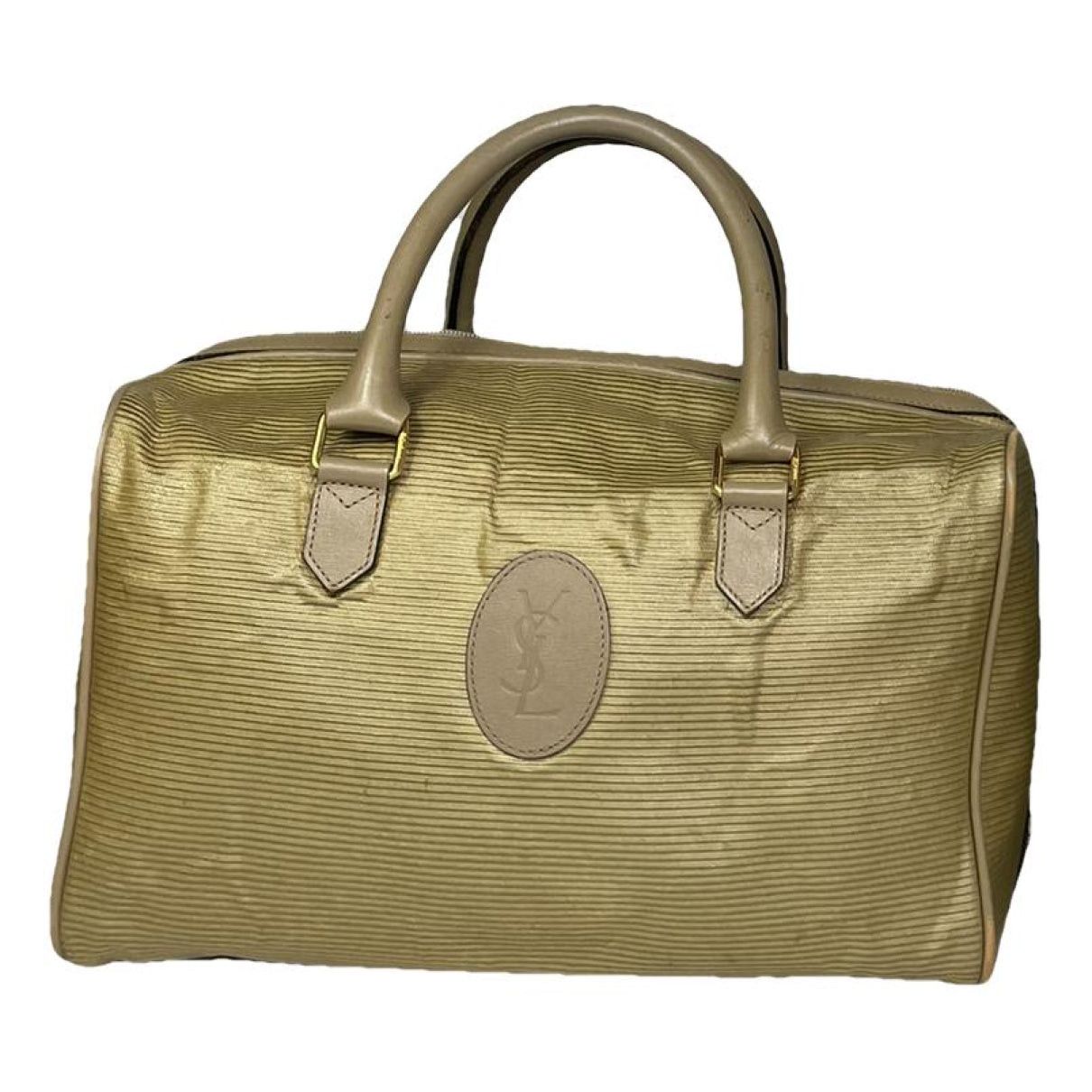 Yves Saint Laurent Gold Leather Travel Bag Size ONE SIZE - 1 Thumbnail