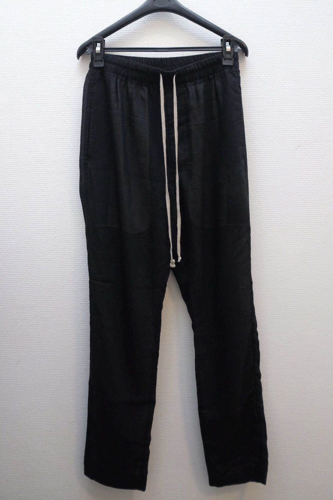 image of Rick Owens Drawstring Wool Blend Trousers in Black, Men's (Size 32)