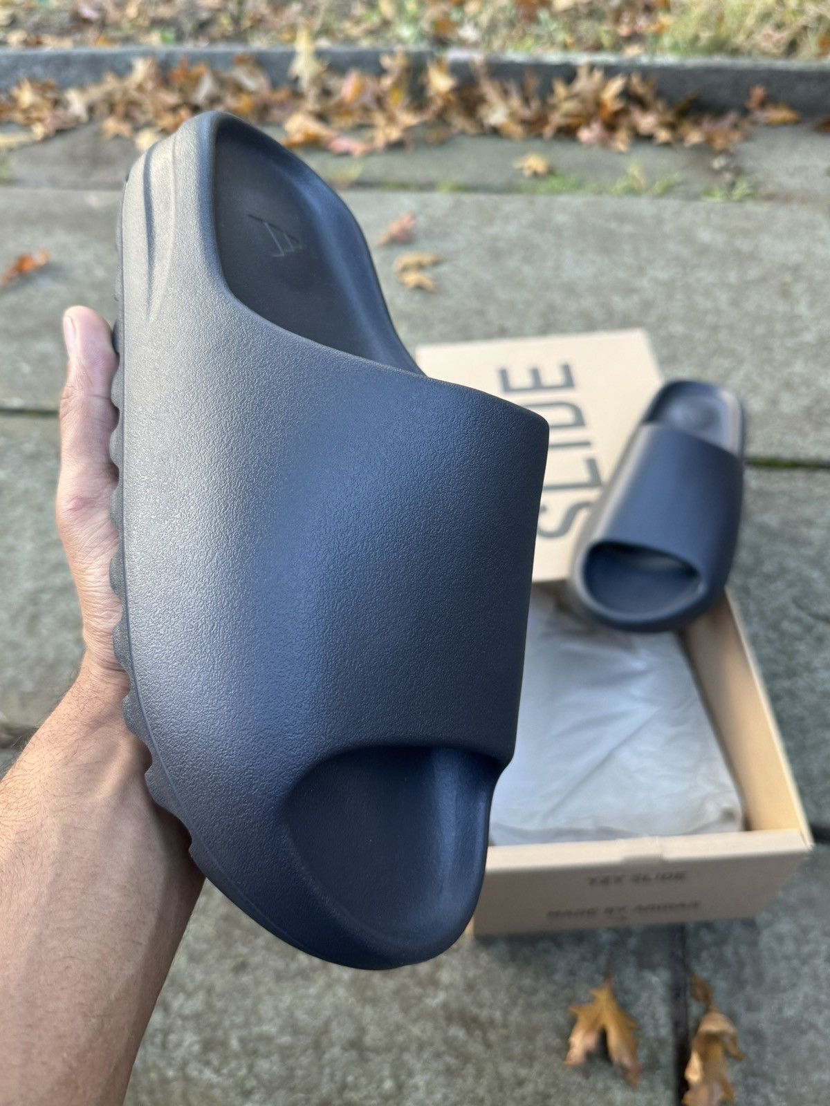 Yeezy Slides Onyx | Grailed