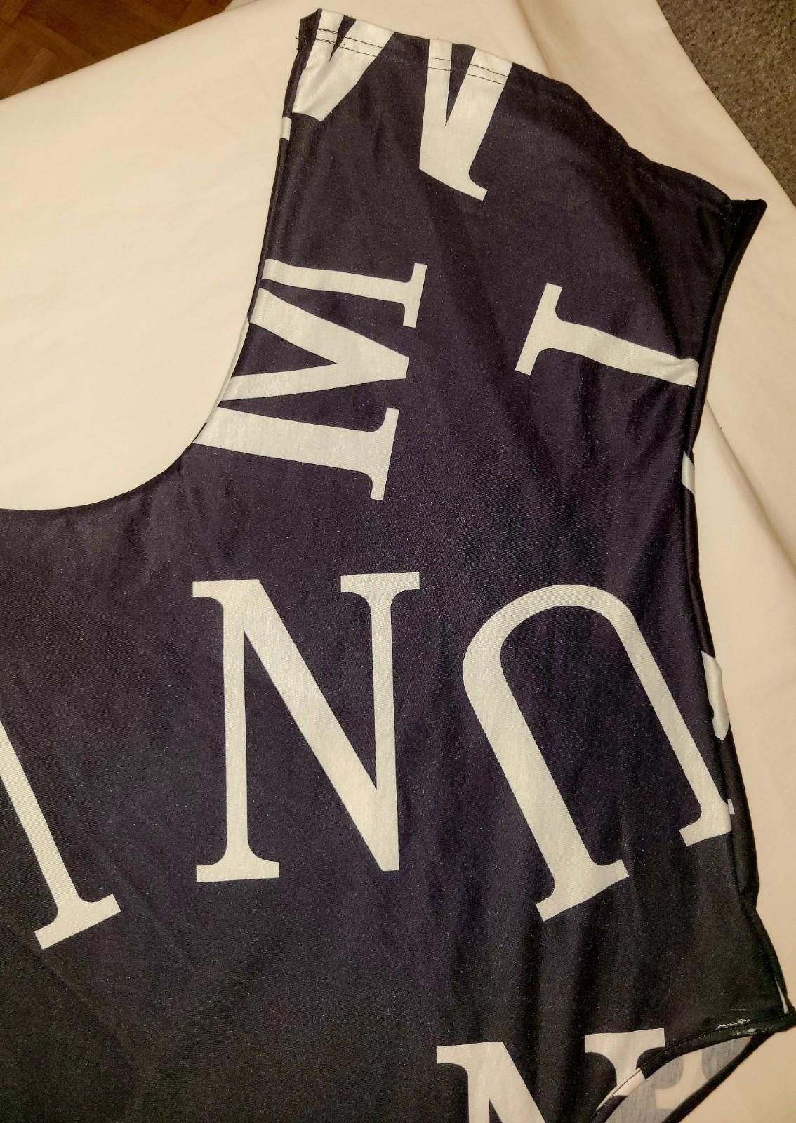 The Unbranded Brand women's 2XL asymetric blk. blouse w/ wht. block letters Size XXL / US 16-18 / IT 52-54 - 4 Thumbnail