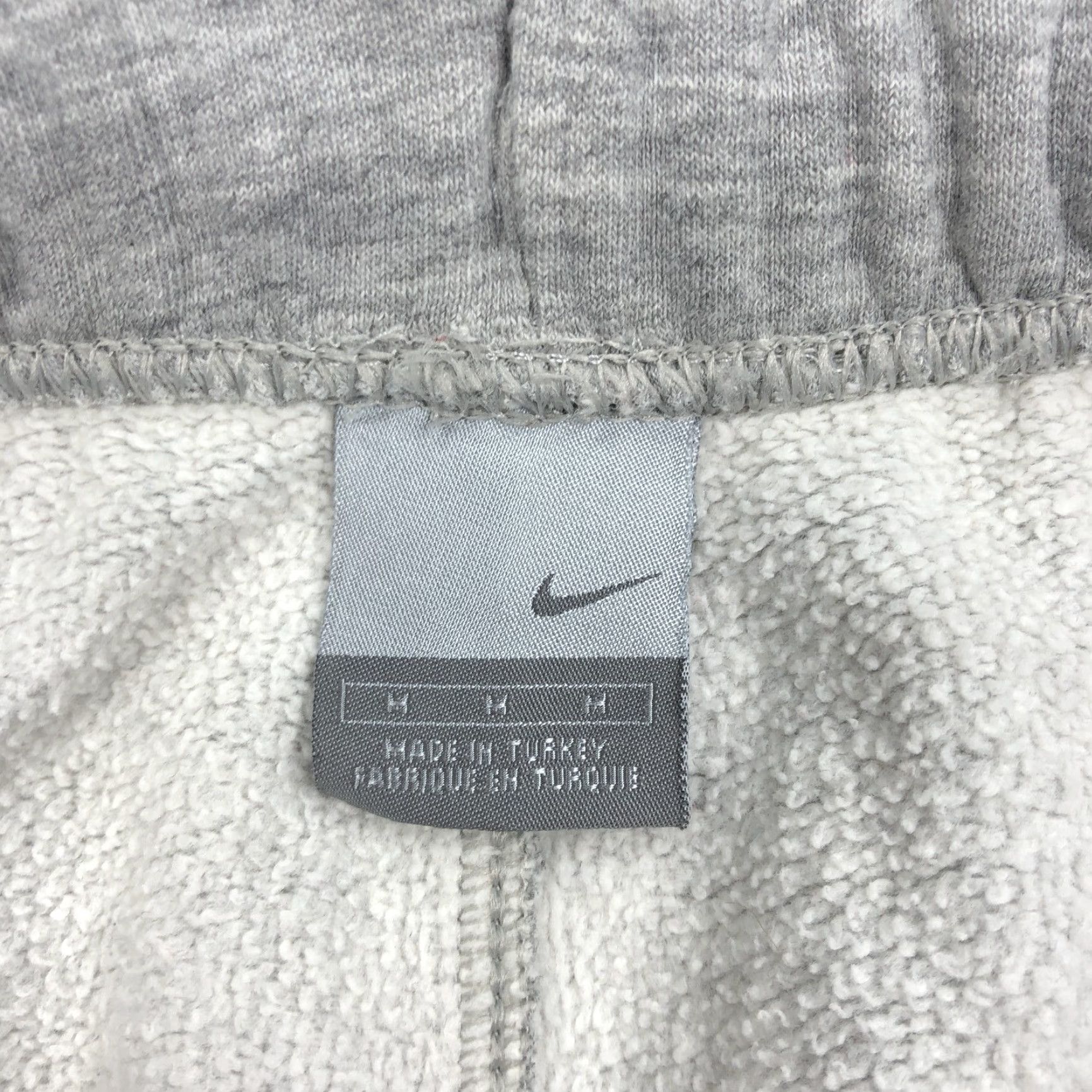 Nike Nike Men's Track Pants Fleece Cotton Blend Gray Heather 34x33 M Regular Elastic Drawstring Pockets Zip Athletic Gym 90s? No Vintage Mens Size US 31 - 7 Thumbnail
