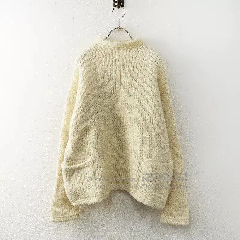 Ivory Wool Knit Sweater.