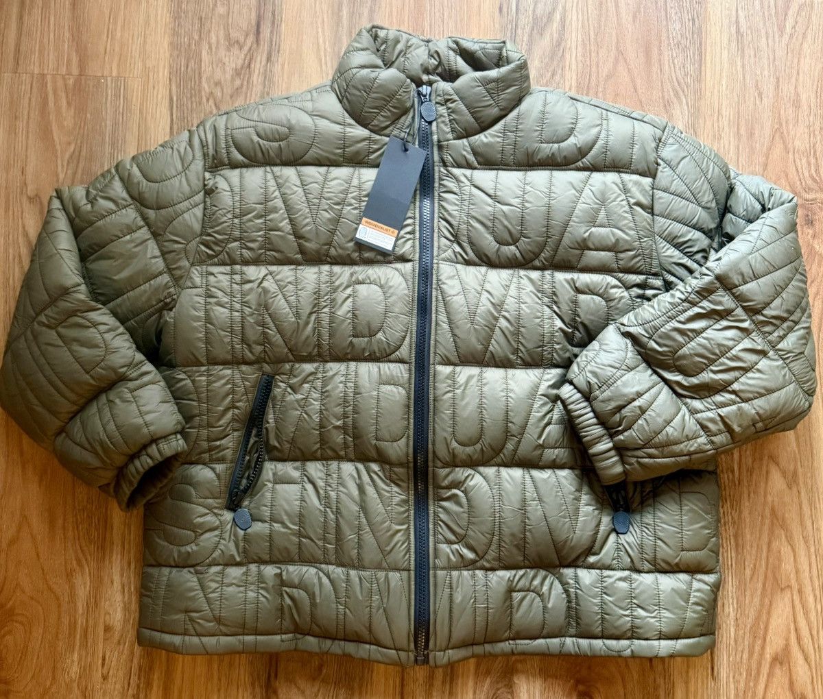 INDIVIDUALIST Individualist, Green puffer large - spell out Size US L / EU 52-54 / 3 - 1 Thumbnail