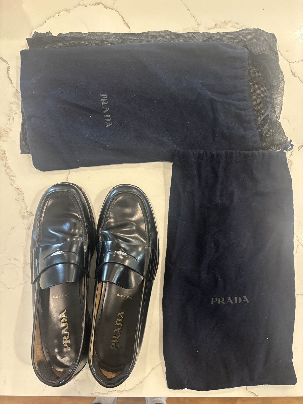 Prada brushed penny loafers