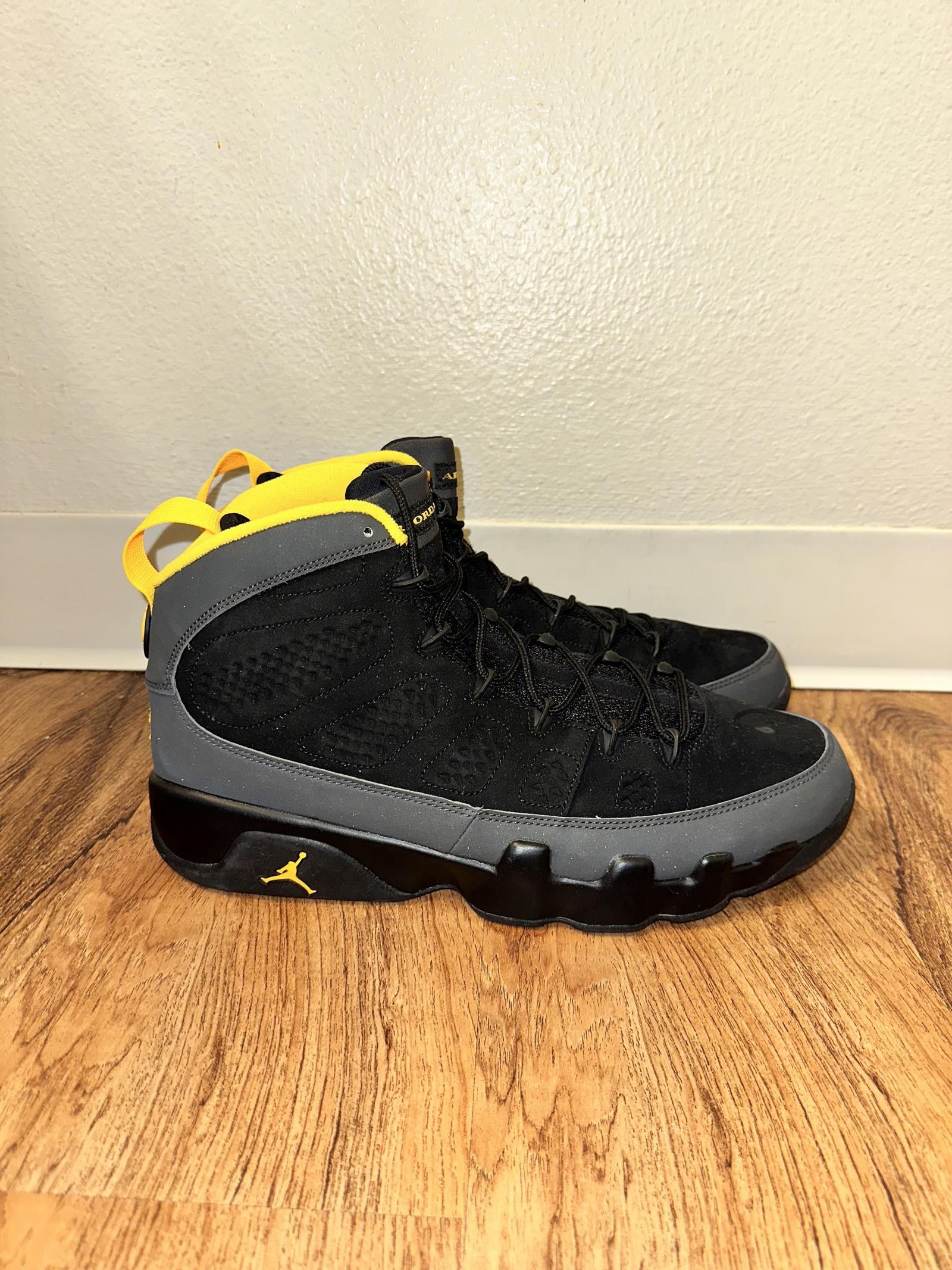 image of Jordan Brand 9 Retro Dark Charcoal University Gold Shoes in Black, Men's (Size 13)
