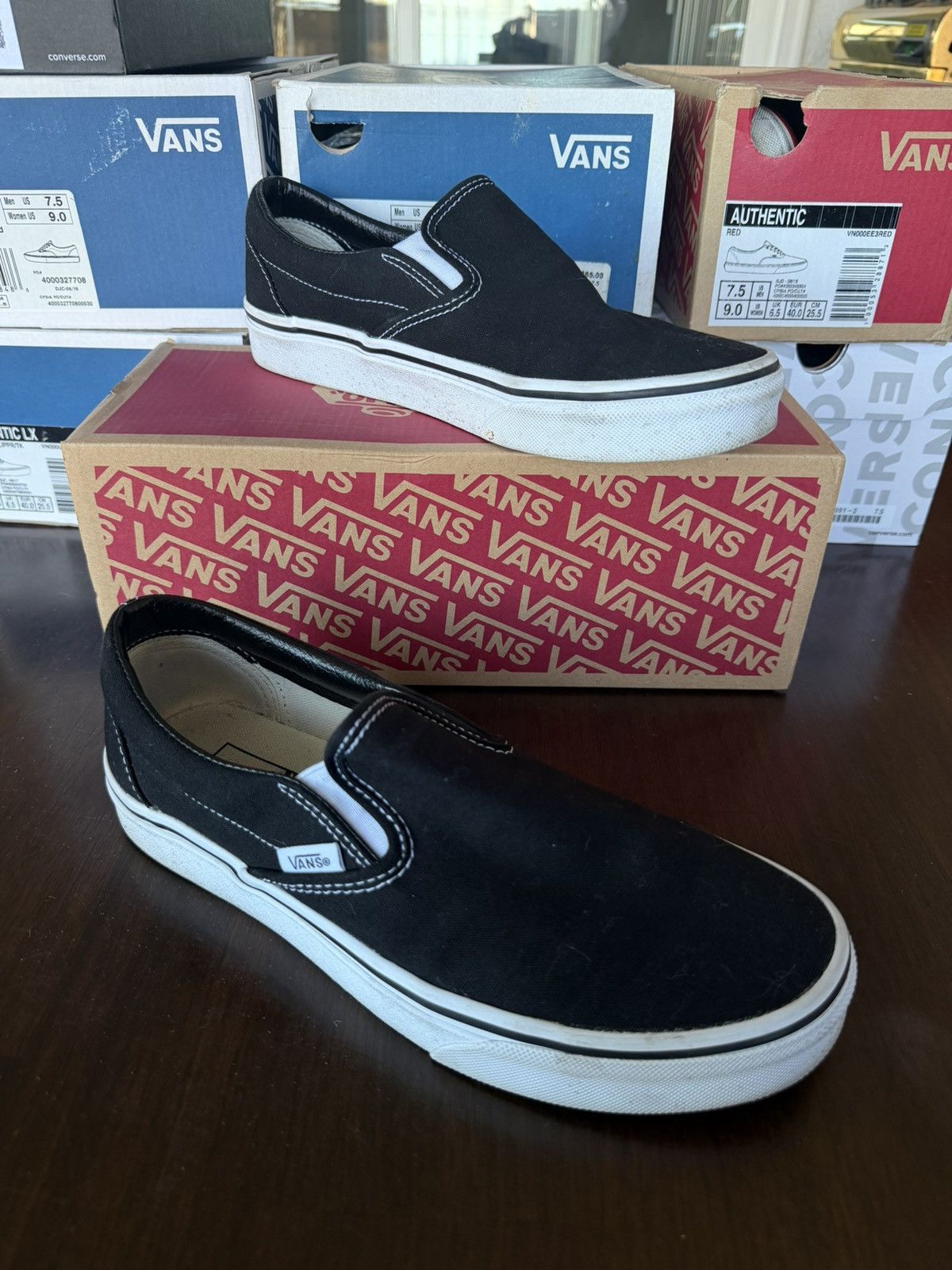 Vans slip on black