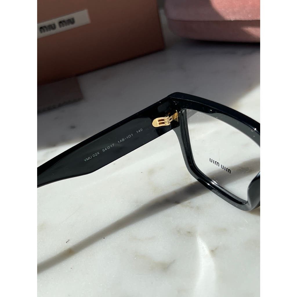 【送料,関税込】MIU MIU メガネ MU02XV Miu Miu VMU02X Cat Eye Glasses | Fashion Eyewear US