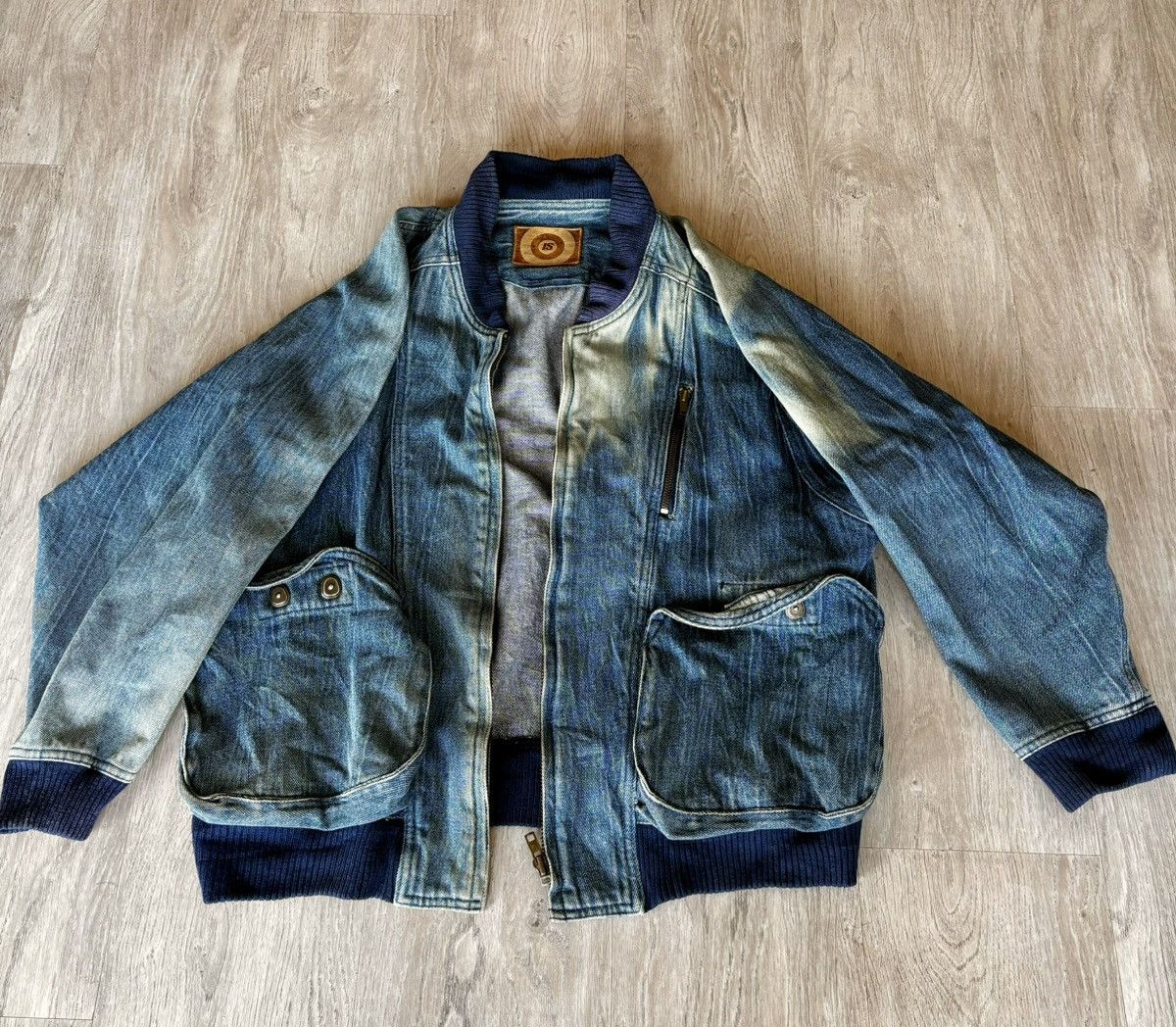 image of Issey Miyake Sun Faded Denim Bomber in Blue, Men's (Size Small)