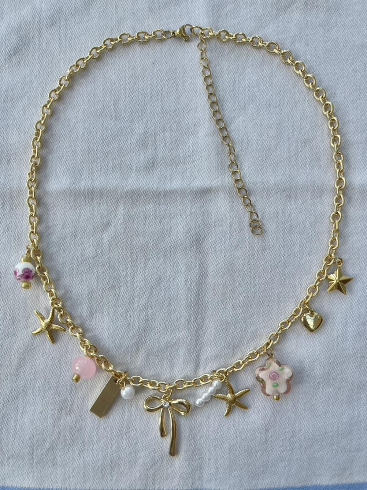 Other Gold plated pink beaded bow starfish charm pendant necklace Size ONE SIZE - 1 Thumbnail