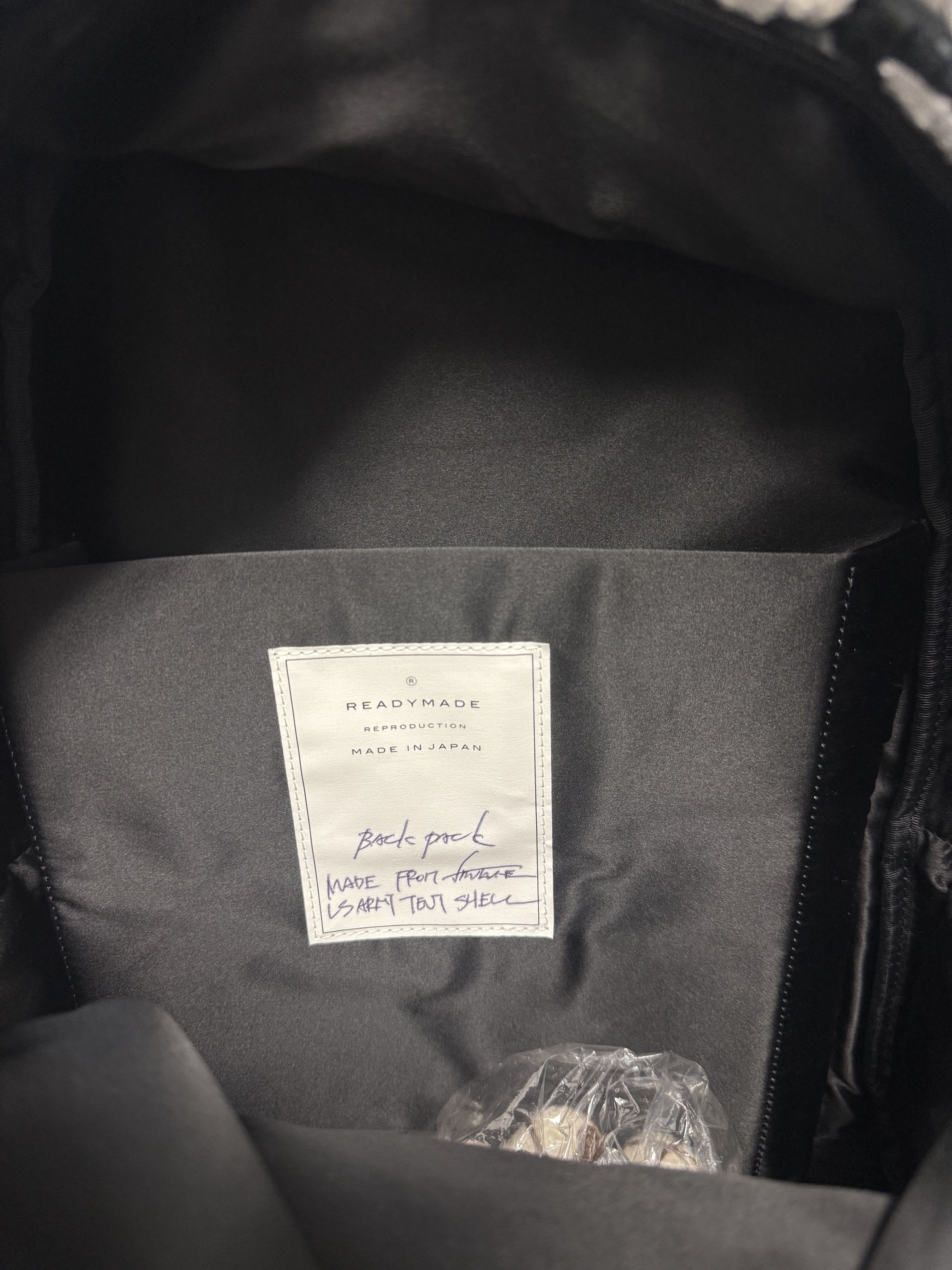 DENIM TEARS × READYMADE Cotton Wreath Tweed Backpack Size ONE SIZE - 7 Thumbnail