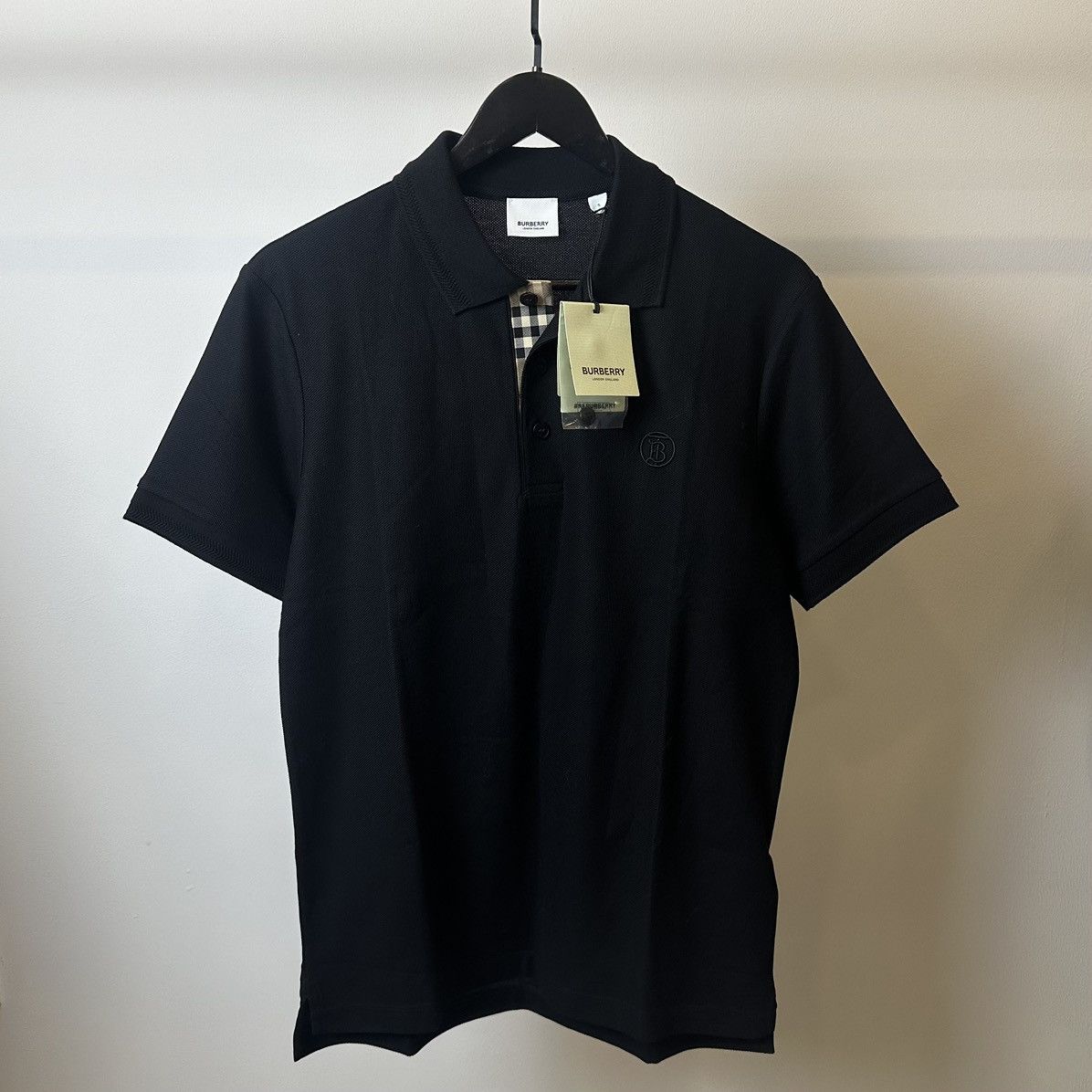 Image of Burberry Check Nova Polo Shirt in Black, Men's (Size Small)