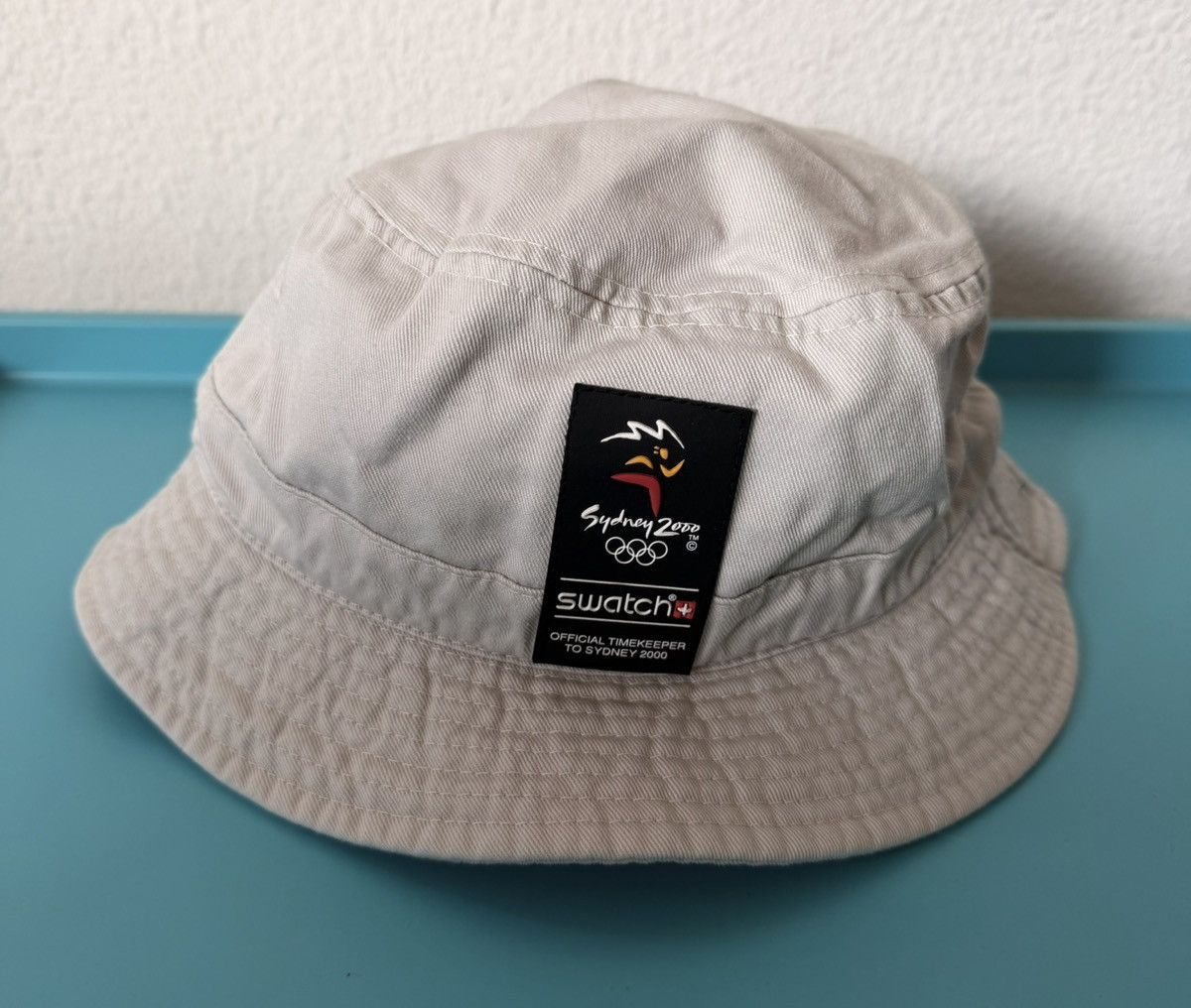 Swatch Swatch × Sydney 2000 Olympics Bucket Hat Beige 58cm Y2K Size ONE SIZE - 1 Thumbnail