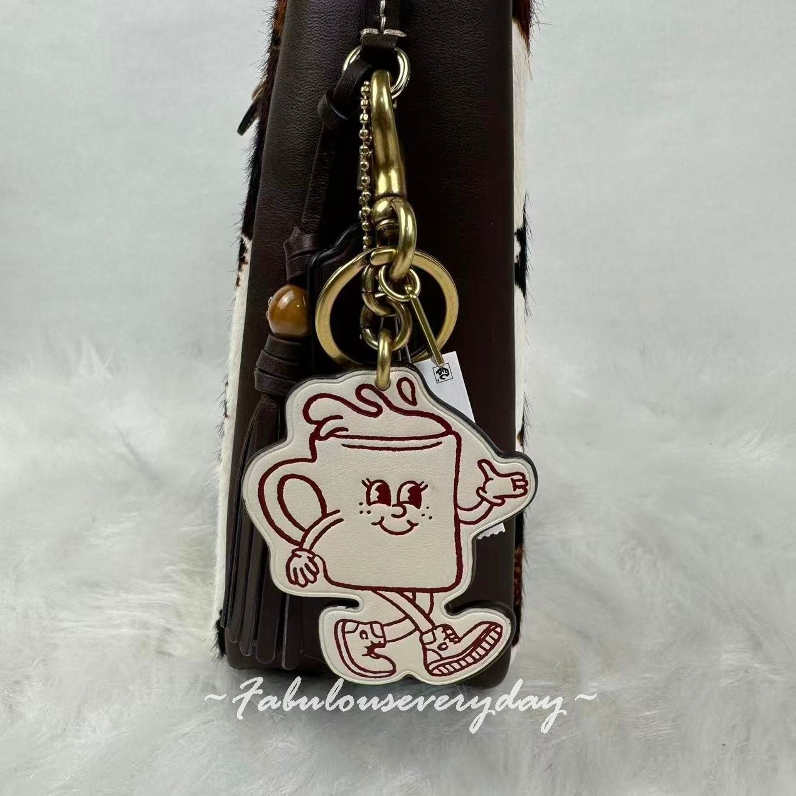 Coach COACH Coffee Cup Bag Charm Lil Miss Jo Leather/Brass/Chalk Size ONE SIZE - 1 Thumbnail