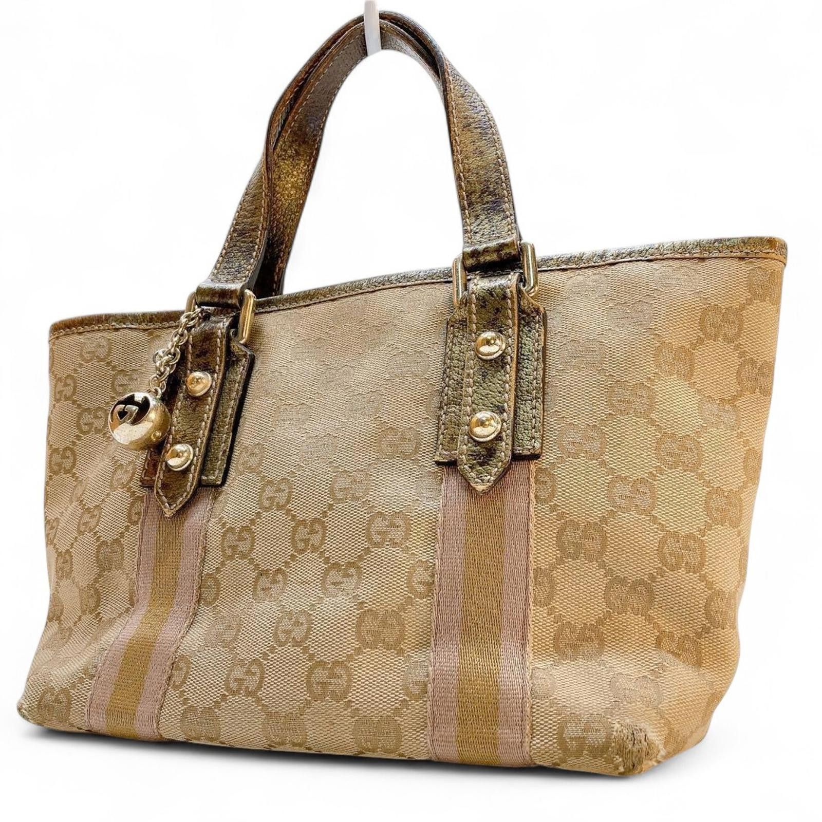 Gucci Gucci - Beige Monogram Canvas Handbag with Gold Accents Size ONE SIZE - 2 Thumbnail