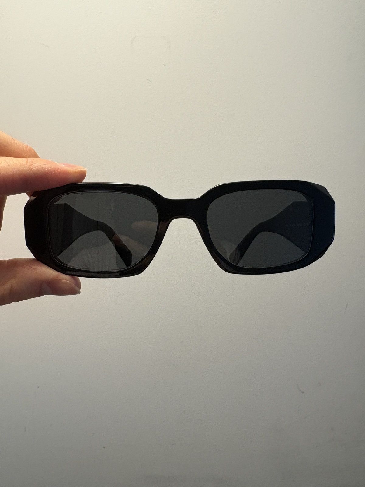 Prada Prada 17WS Noir/Black Symbole Sunglasses Size ONE SIZE - 1 Thumbnail
