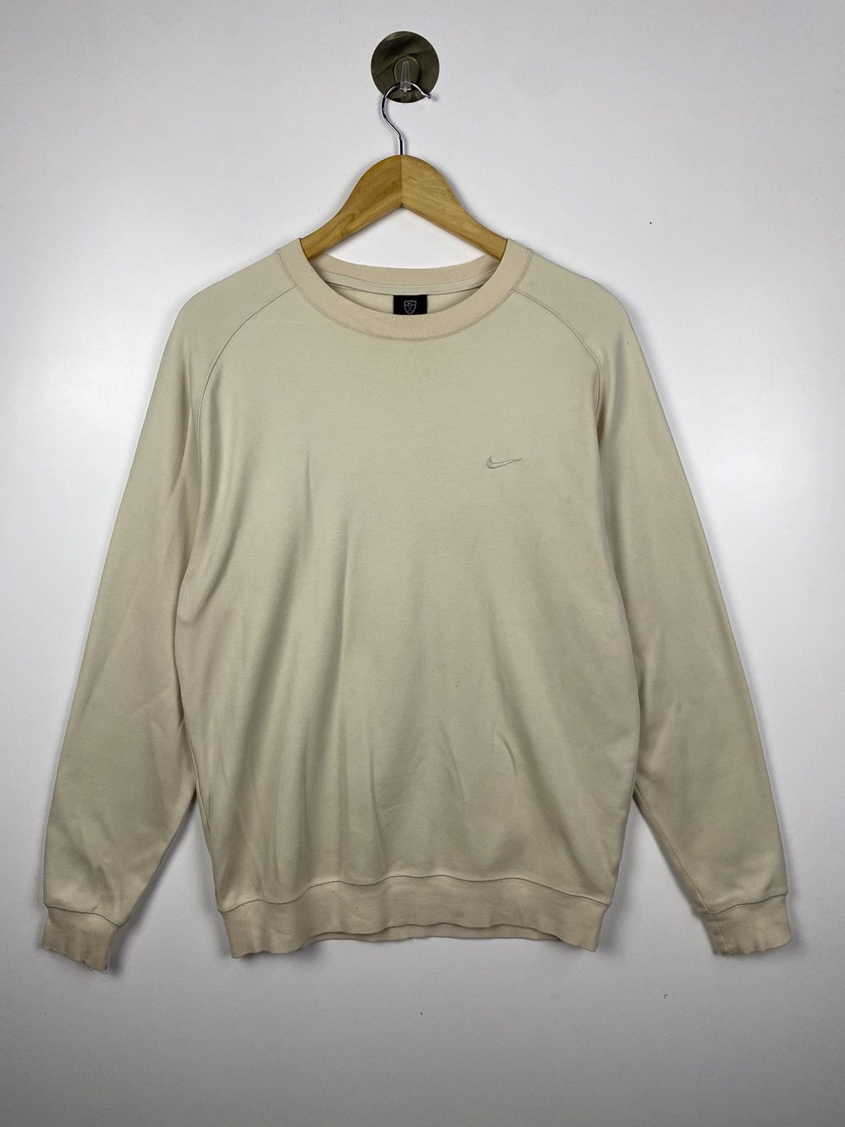 image of Vintage Y2K Nike Golf Small Swoosh in Cream, Men's (Size Medium)