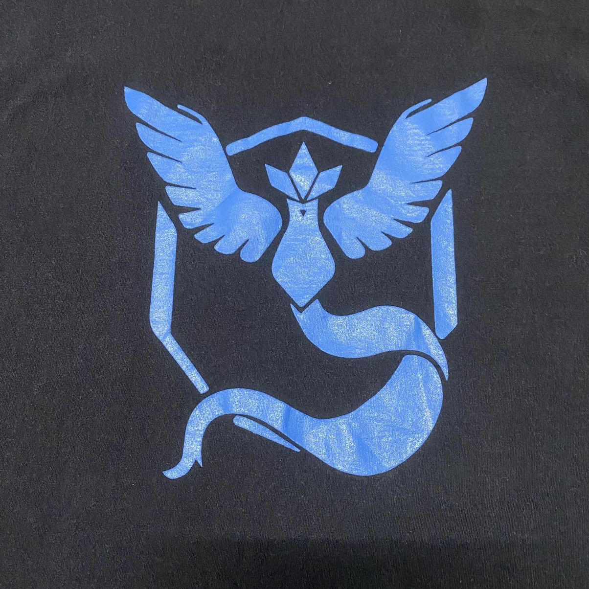 Cartoon Network × Pokemon × Vintage Y2K POKEMON GO TEAM MYSTIC LOGO ANIME T SHIRT NINTENDO Size US L / EU 52-54 / 3 - 6 Thumbnail