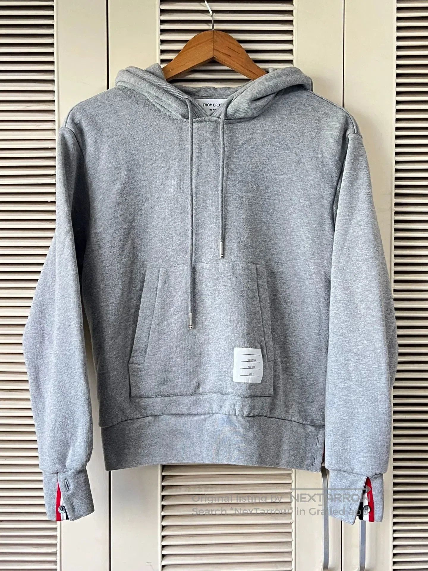 thom browne gray hoodie with stripes.